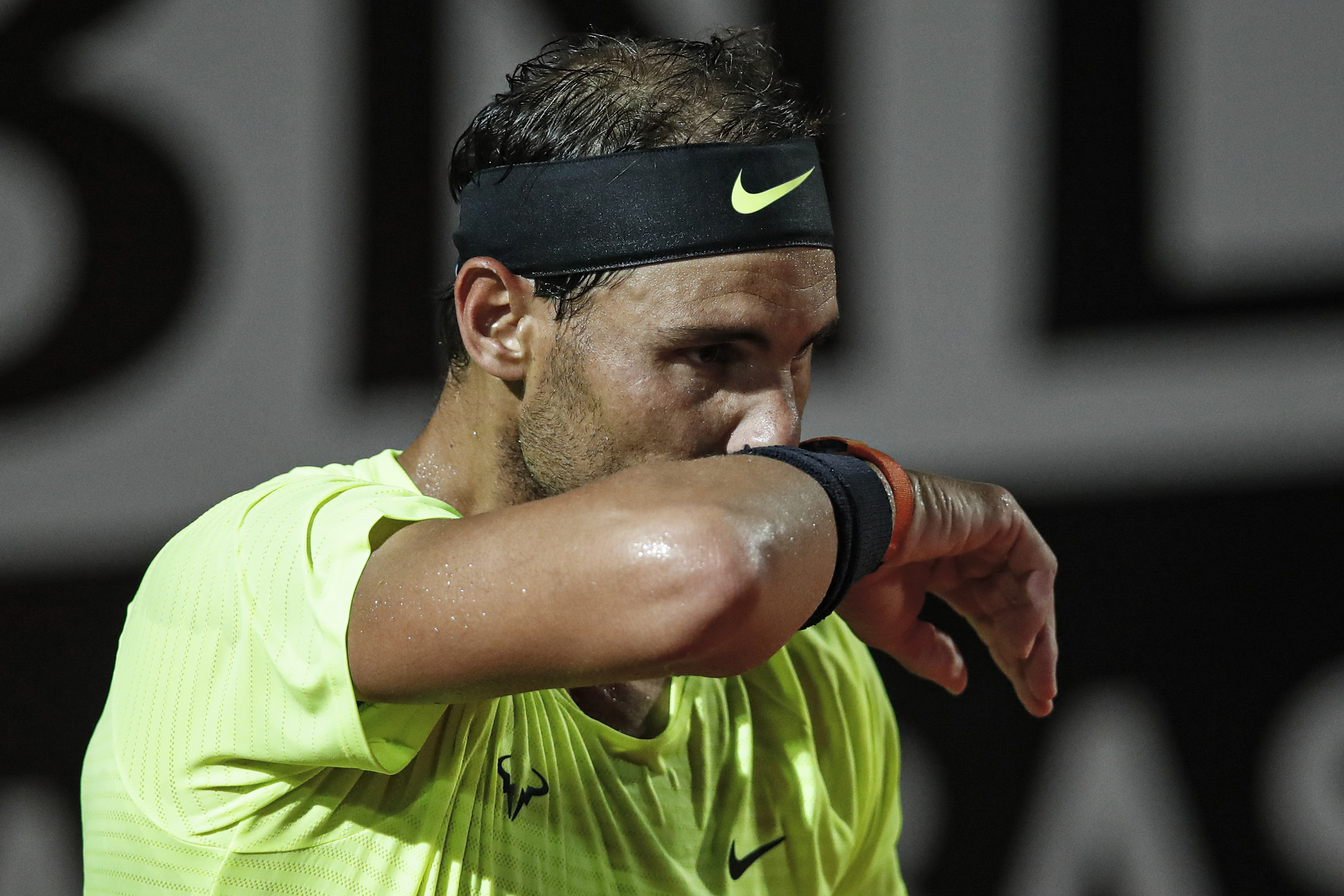 epa08682641 Rafael Nadal of Spain reacts during his men's singles quarter-finals round match against Diego Schwartzman of Argentina at the Italian Open tennis tournament in Rome, Italy, 19 September 2020.  EPA-EFE/Clive Brunskill / POOL