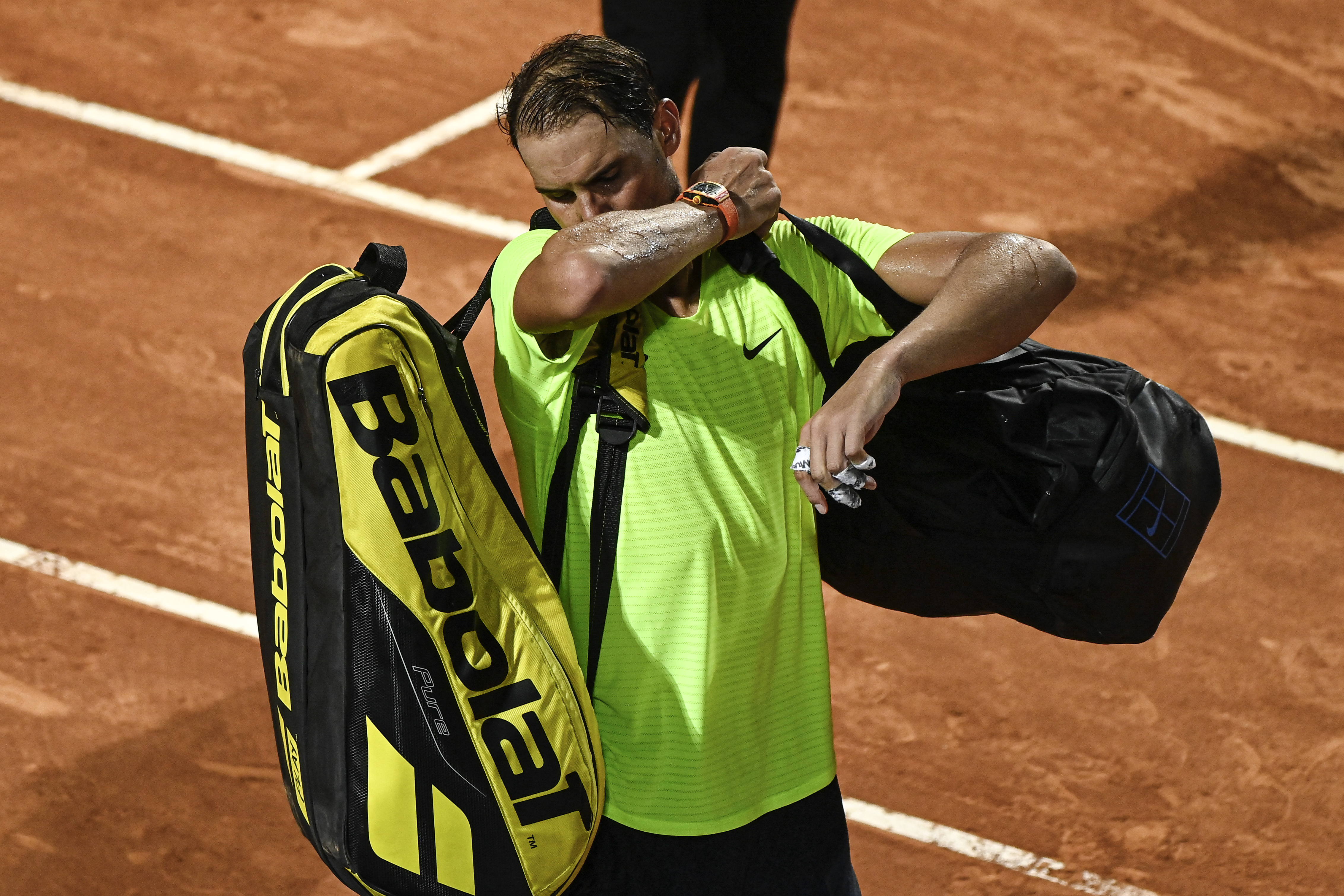 epa08682781 Rafael Nadal of Spain reacts after his men's singles quarter-finals round match against Diego Schwartzman of Argentina at the Italian Open tennis tournament in Rome, Italy, 19 September 2020.  EPA-EFE/CLIVE BRUNSKILL/ POOL