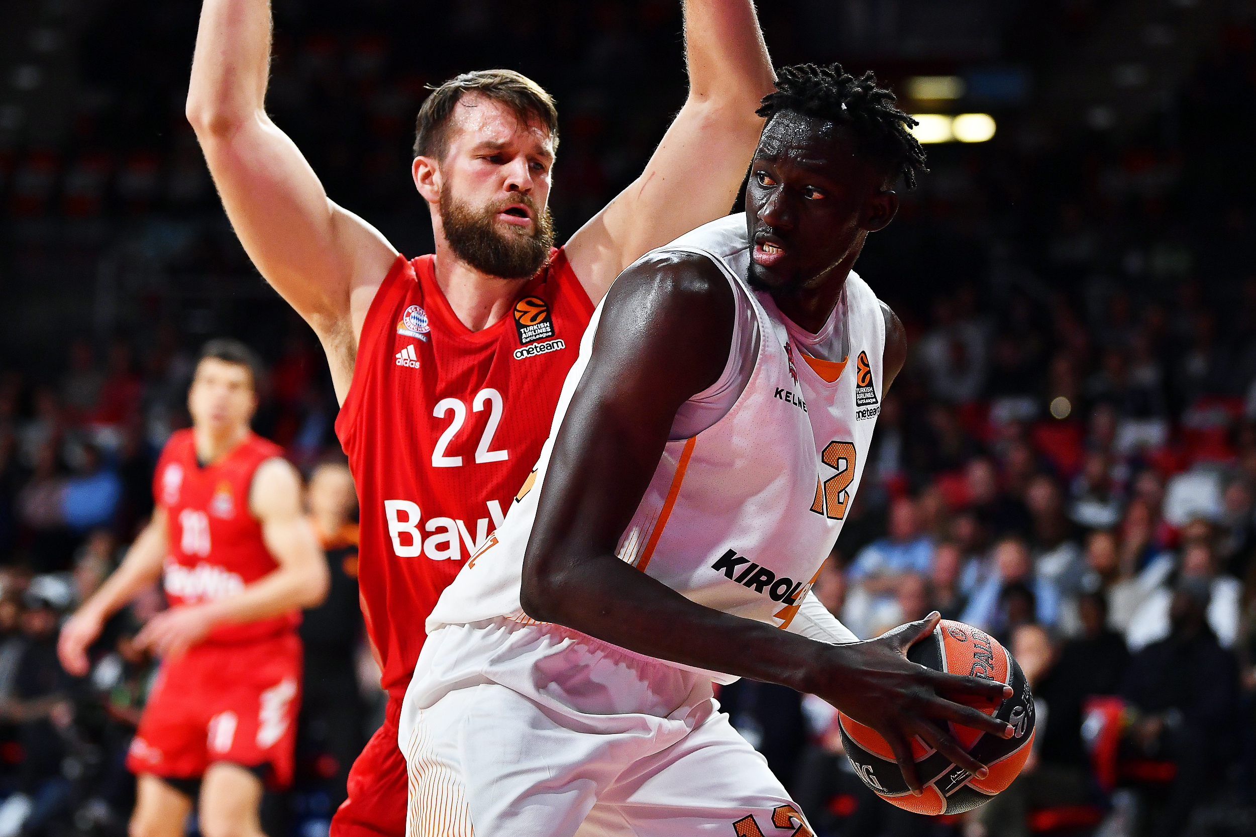 epa08270275 Munich's Danilo Barthel (L) in action against Vitoria's Ilimane Diop (R) during the Euroleague basketball match between Bayern Munich and Baskonia Vitoria-Gasteiz in Munich, Germany, 04 March 2020.  EPA-EFE/PHILIPP GUELLAND