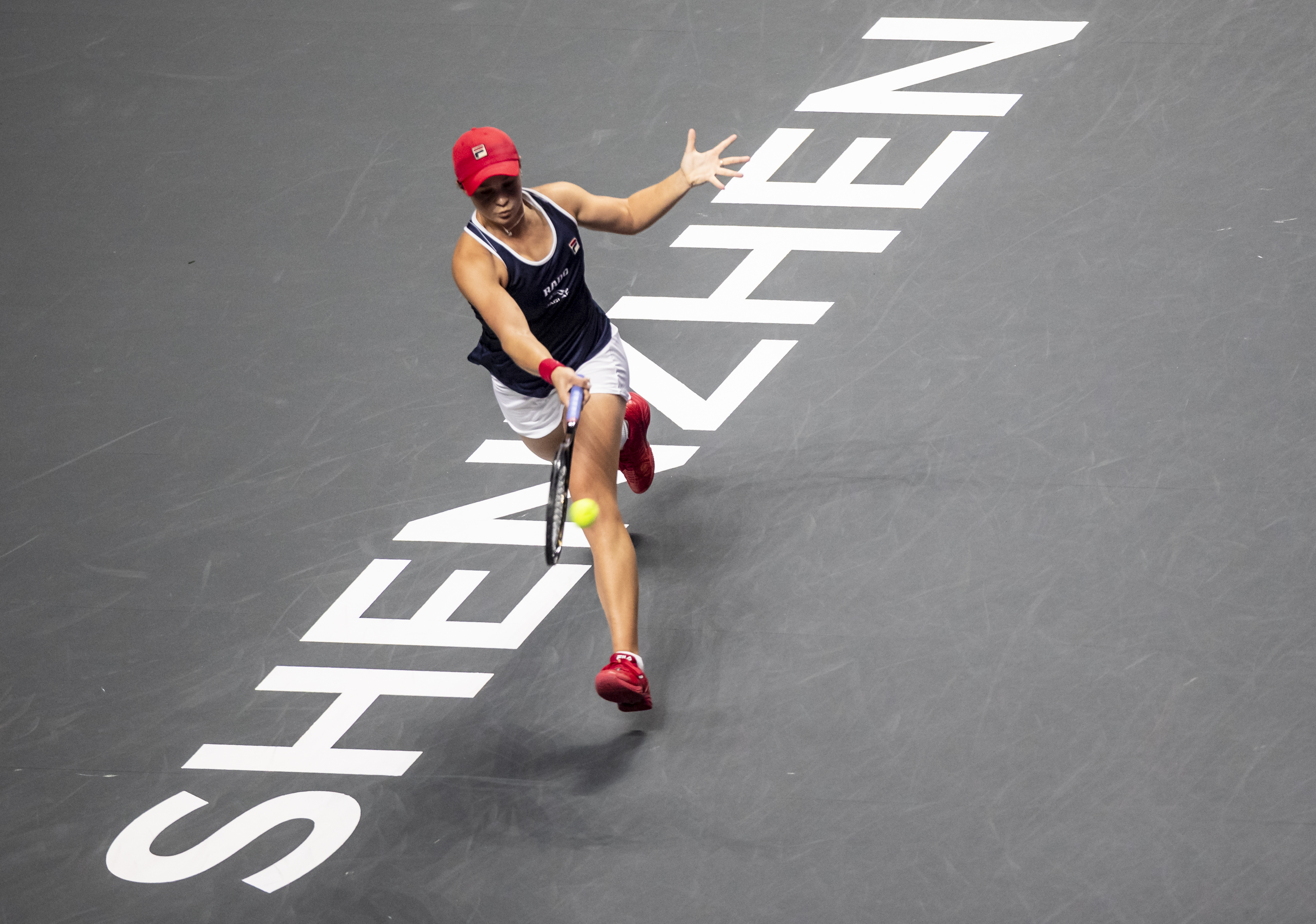 epa07969700 Ashleigh Barty of Australia in action against Elina Svitolina of Ukraine at the WTA Final 2019 tournament final match in Shenzhen, China, 03 November 2019.  EPA-EFE/ALEX PLAVEVSKI