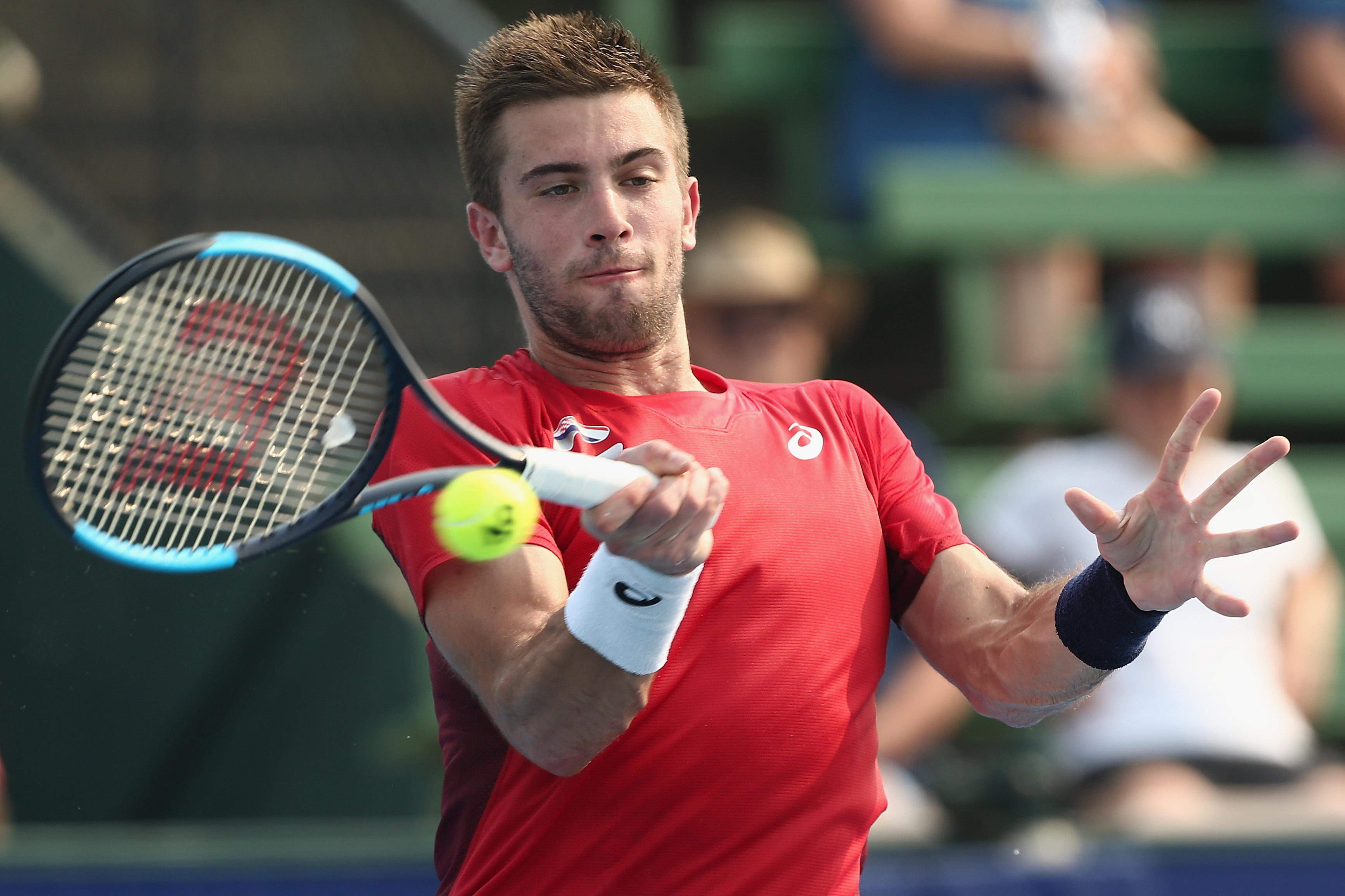 epa08126362 Borna Coric of Croatia in action against Grigor Dimitrov of Bulgaria during the Kooyong Classic at Kooyong Lawn Tennis Club in Melbourne, Australia, 14 January 2020.  EPA-EFE/ROB PREZIOSO AUSTRALIA AND NEW ZEALAND OUT  EDITORIAL USE ONLY
