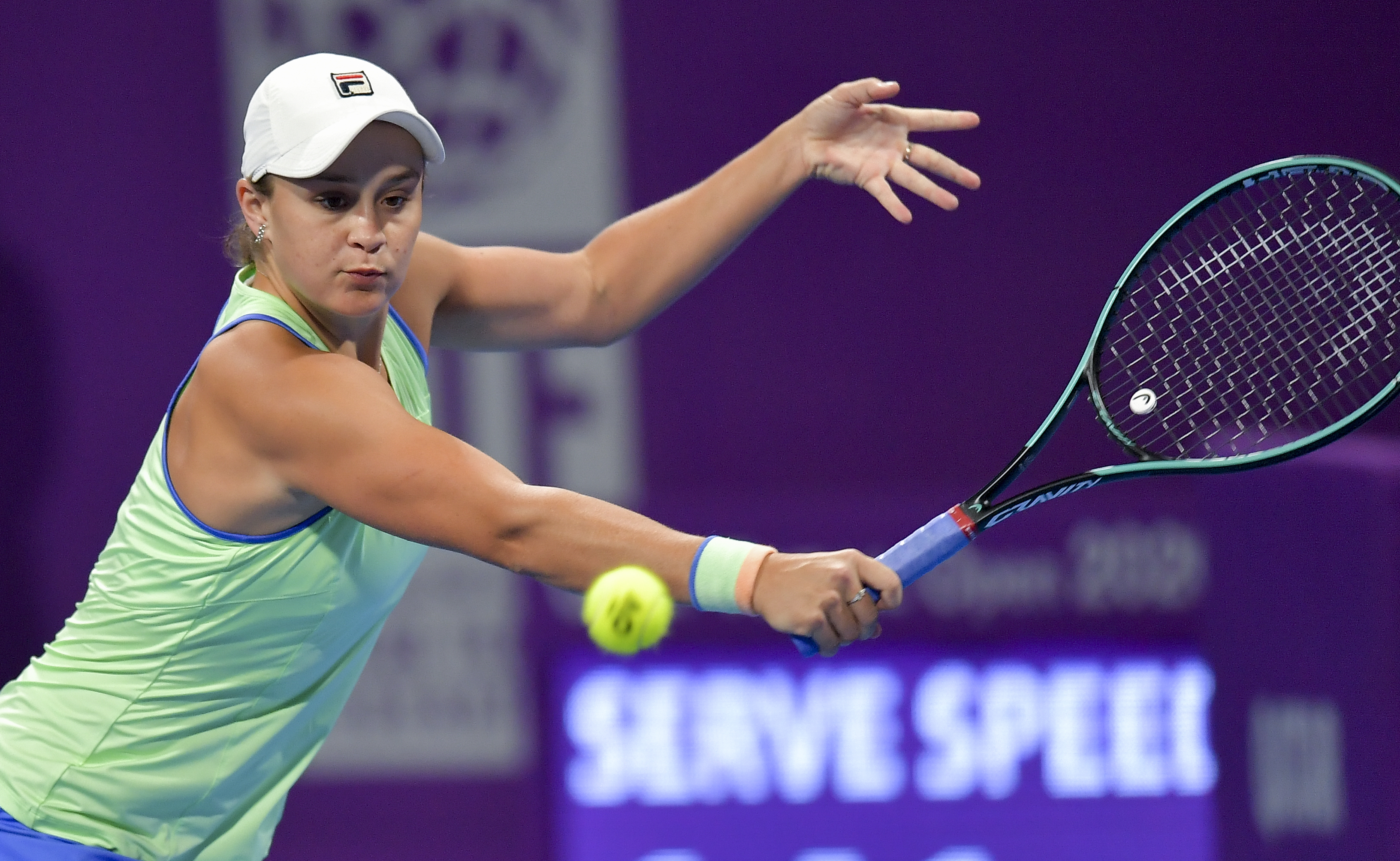 epa08256643 Ashleigh Barty of Australia  in action during her Semi final match against Petra Kvitova of Czech Republic at the WTA Qatar Ladies Open tennis tournament in Doha, Qatar, 28 February 2020.  EPA-EFE/NOUSHAD THEKKAYIL
