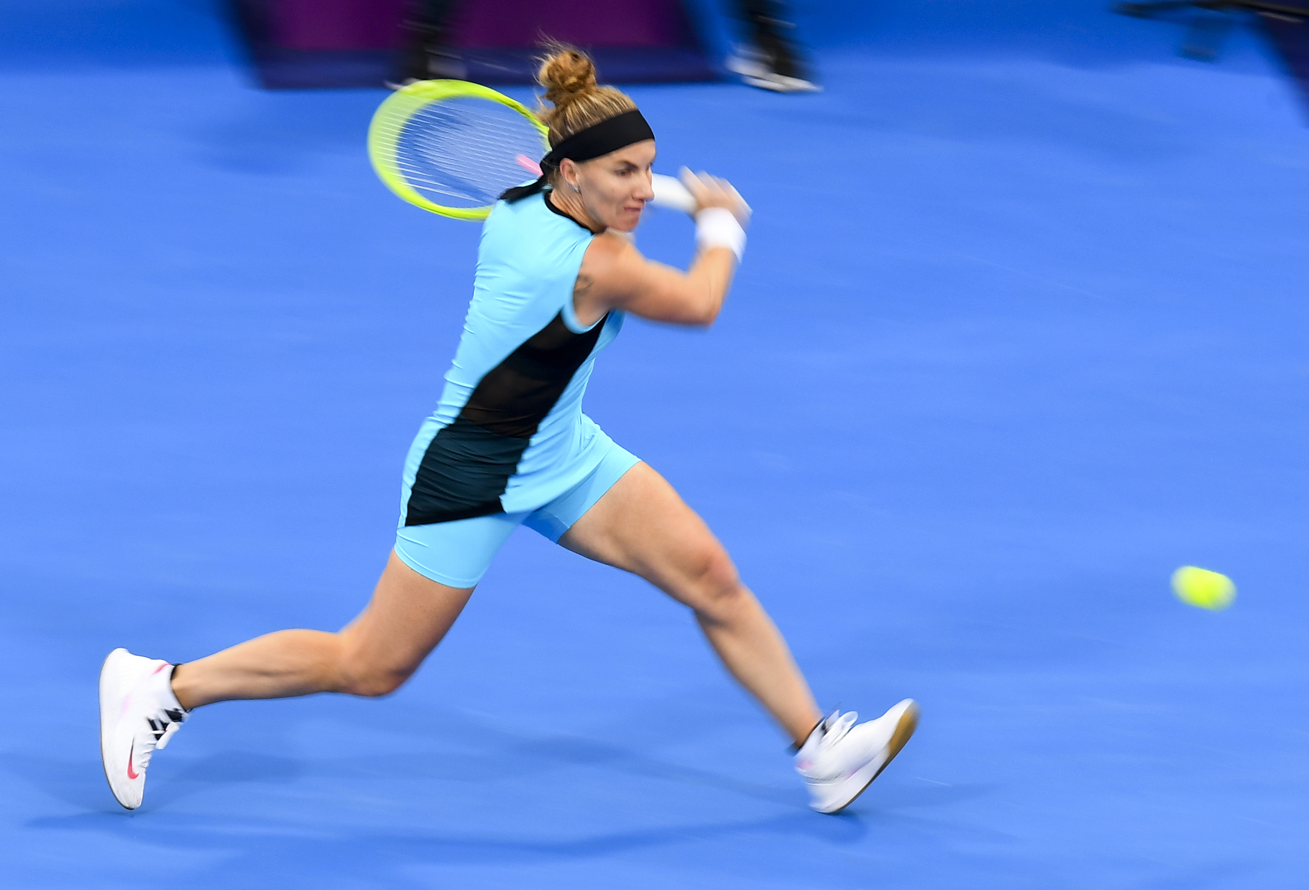 epa08256158 Svetlana Kuznetsova of Russia in action during her Semi final match against Aryna Sabalenka of Belarus  at the WTA Qatar Ladies Op?en tennis tournament in Doha, Qatar, 28 February 2020.  EPA-EFE/NOUSHAD THEKKAYIL