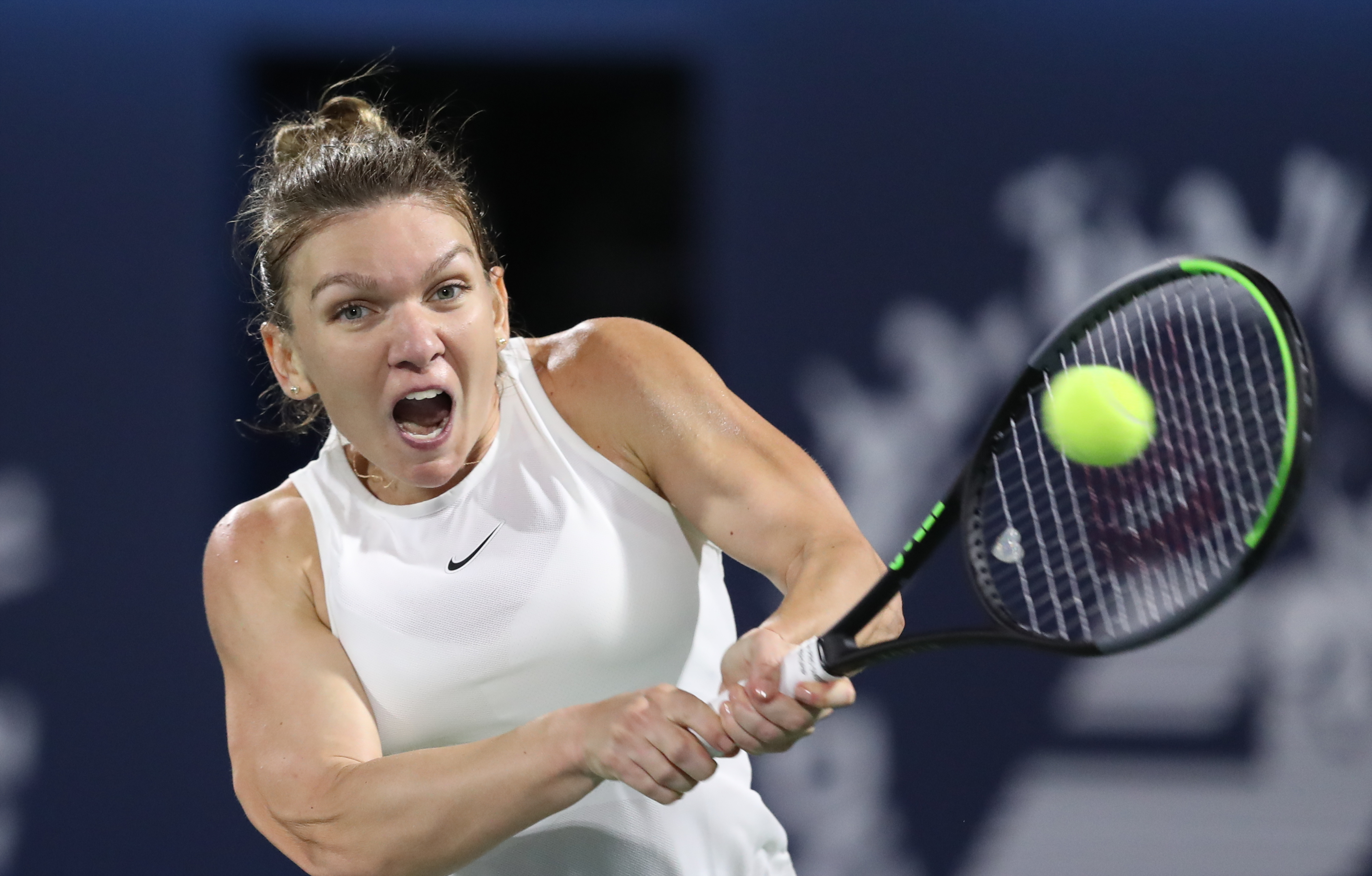 epa08238070 Simona Halep of Romania in action during her final match against Elena Rybakina of Kazakhstan at the Dubai Duty Free Tennis WTA Championships 2020 in Dubai, United Arab Emirates, 22 February 2020.  EPA-EFE/ALI HAIDER