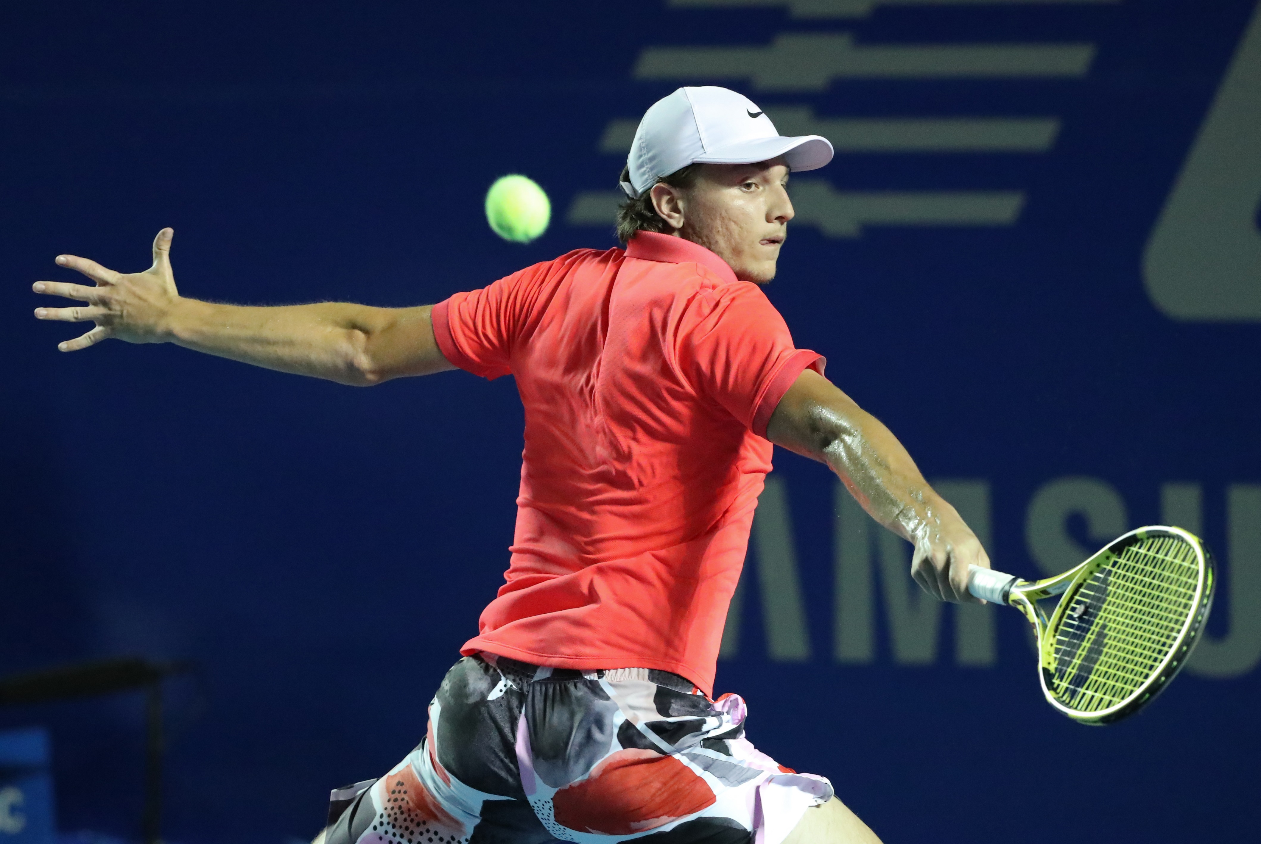 epa08251327 Miomir Kecmanovic of Serbia in action against Rafael Nadal of Spain during their Mexican Open tennis tournament Round of 16 match in Acapulco, Mexico, 26 February 2020.  EPA-EFE/DAVID GUZMAN