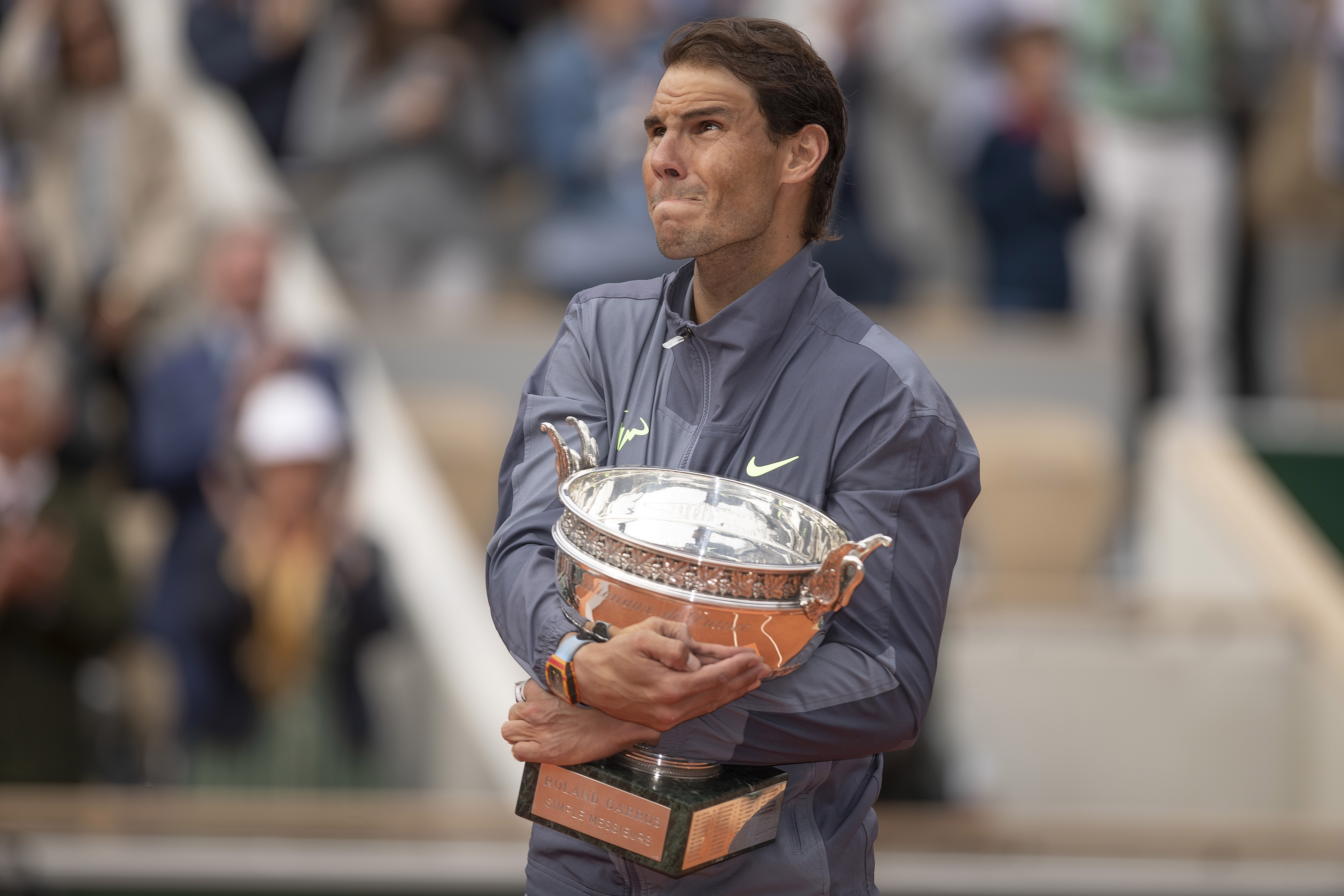 Jun 9, 2019; Paris, France; Rafael Nadal (ESP) poses with the trophy after defeating Dominic Thiem (AUT) in the mens final on day 15 at Stade Roland Garros. Mandatory Credit: Susan Mullane-USA TODAY Sports - 12865616