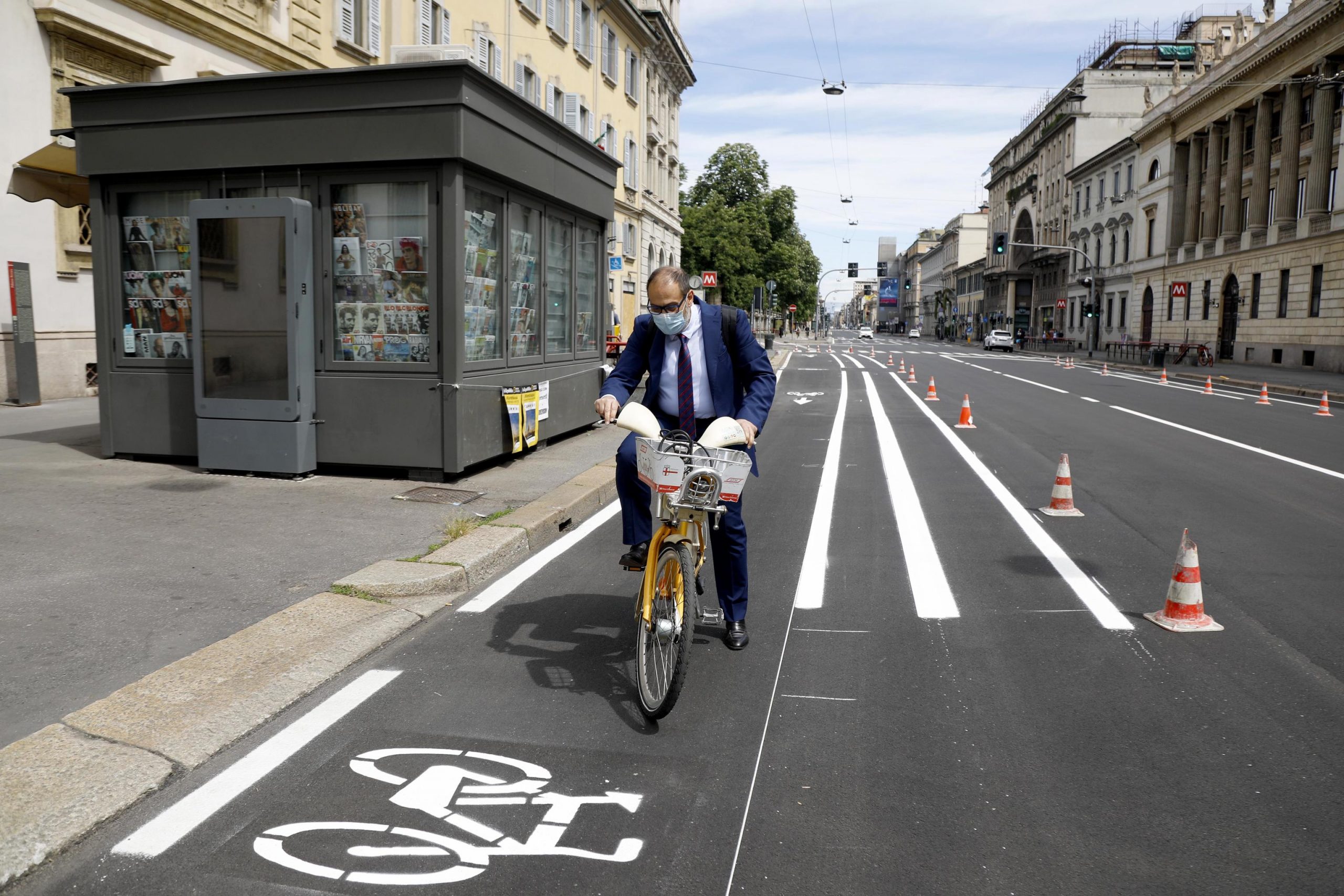 epa08397503 Councilor for Mobility and Public Works, Marco Granelli, rides on the new bike path built in Venezia street in view of Phase 2 of the Coronavirus emergency, in Milan, Italy, 02 May 2020.  EPA-EFE/MOURAD BALTI TOUATI