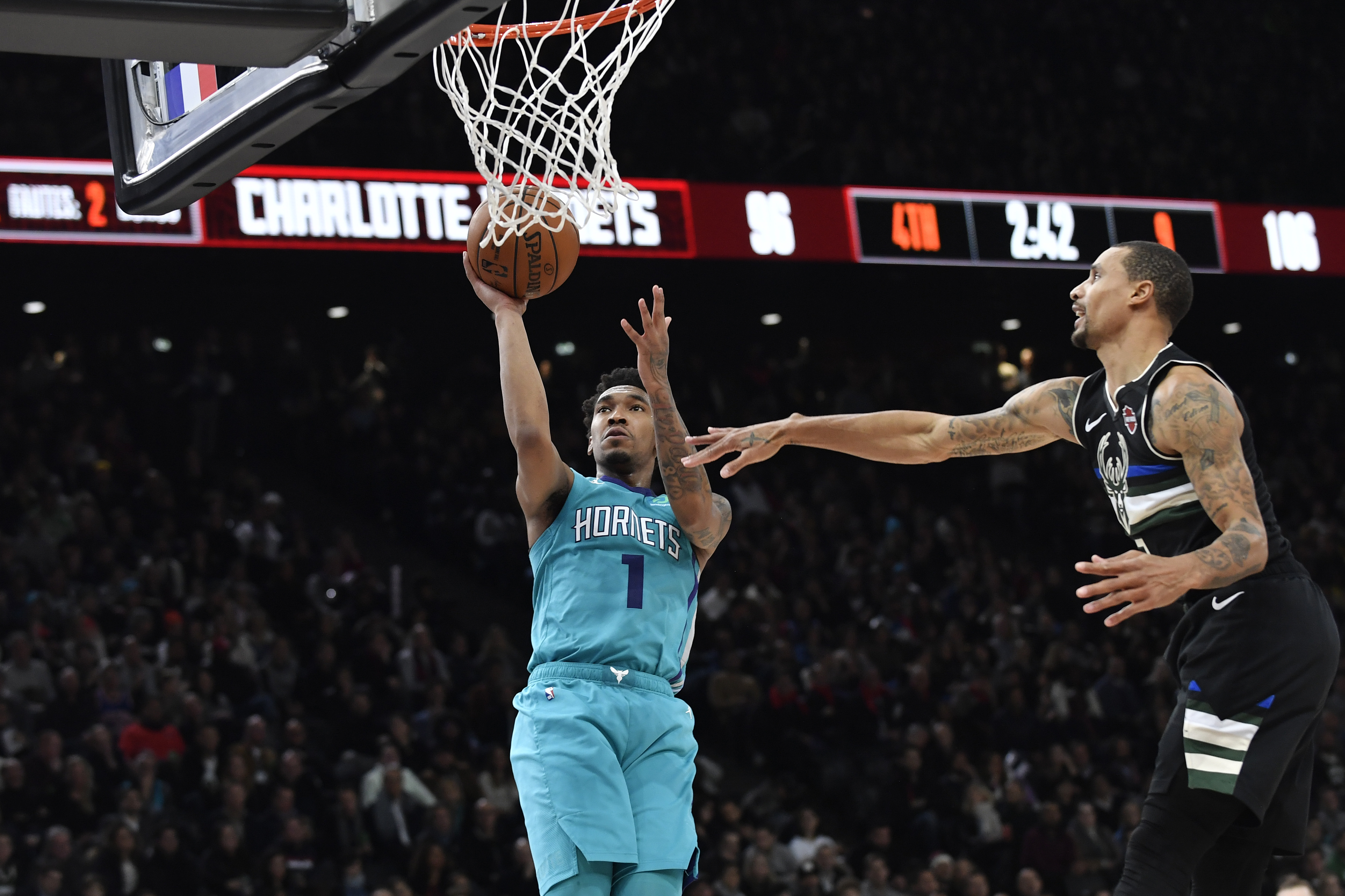 epa08161075 Charlotte Hornet guard Malik Monk in action during the NBA basketball game between the Charlotte Hornets and the Milwaukee Bucks at AccorHotels Arena, in Paris, France, 24 January 2020.  EPA-EFE/JULIEN DE ROSA