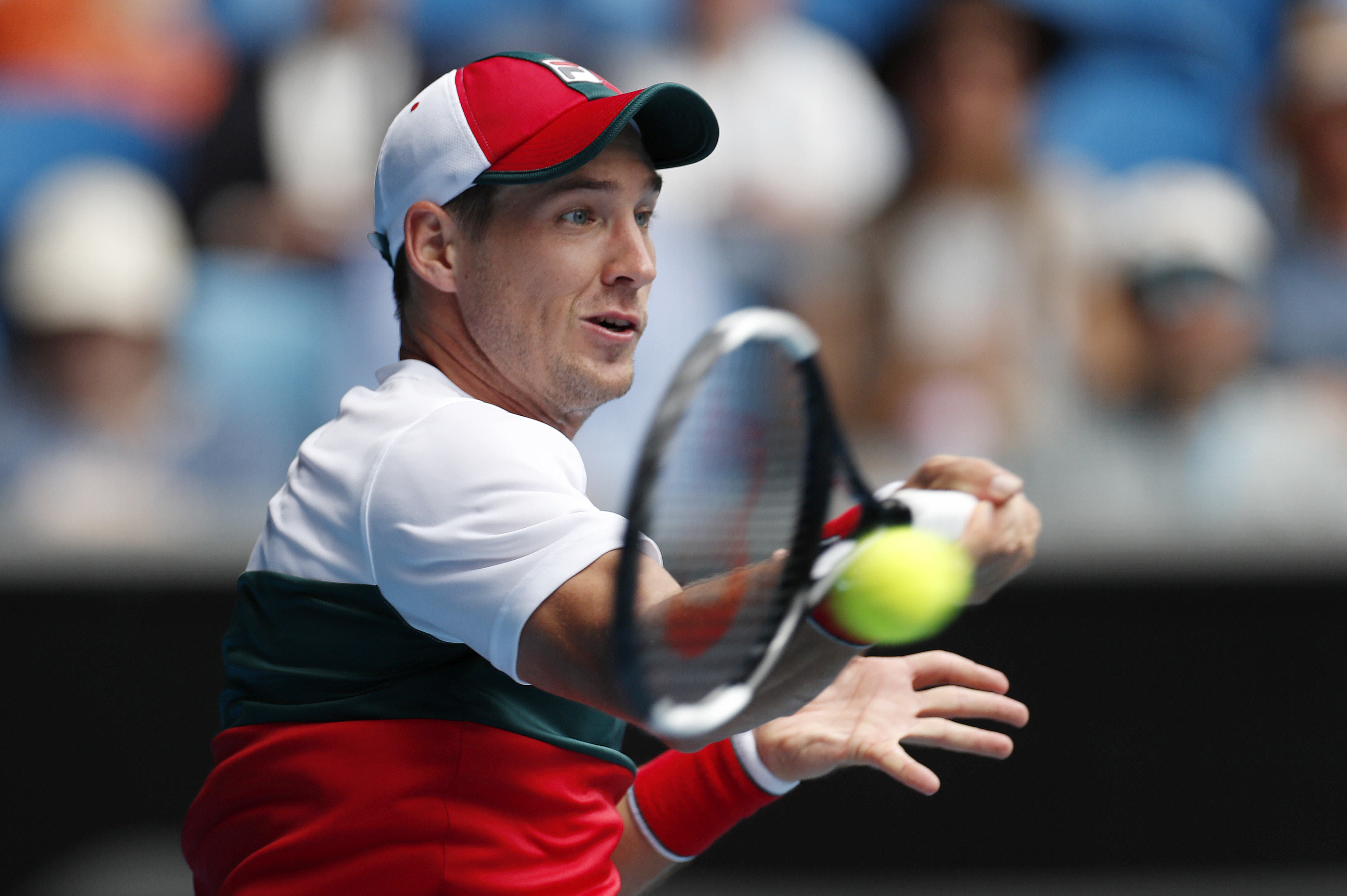 epa08156756 Dusan Lajovic of Serbia in action during his men's singles third round match against Diego Schwartzman of Argentina at the Australian Open Grand Slam tennis tournament in Melbourne, Australia, 24 January 2020. EPA-EFE/ROMAN PILIPEY