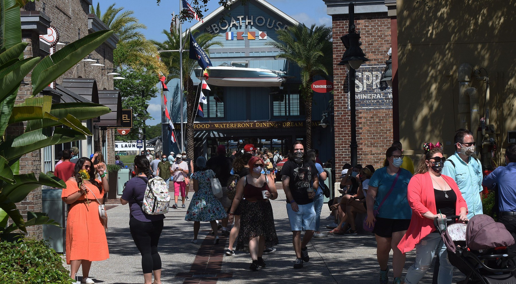People visit Disney Springs at Walt Disney World on the day the retail, dining, and entertainment complex begins a phased reopening following the closure of the theme park on March 16, 2020 due to the coronavirus pandemic.