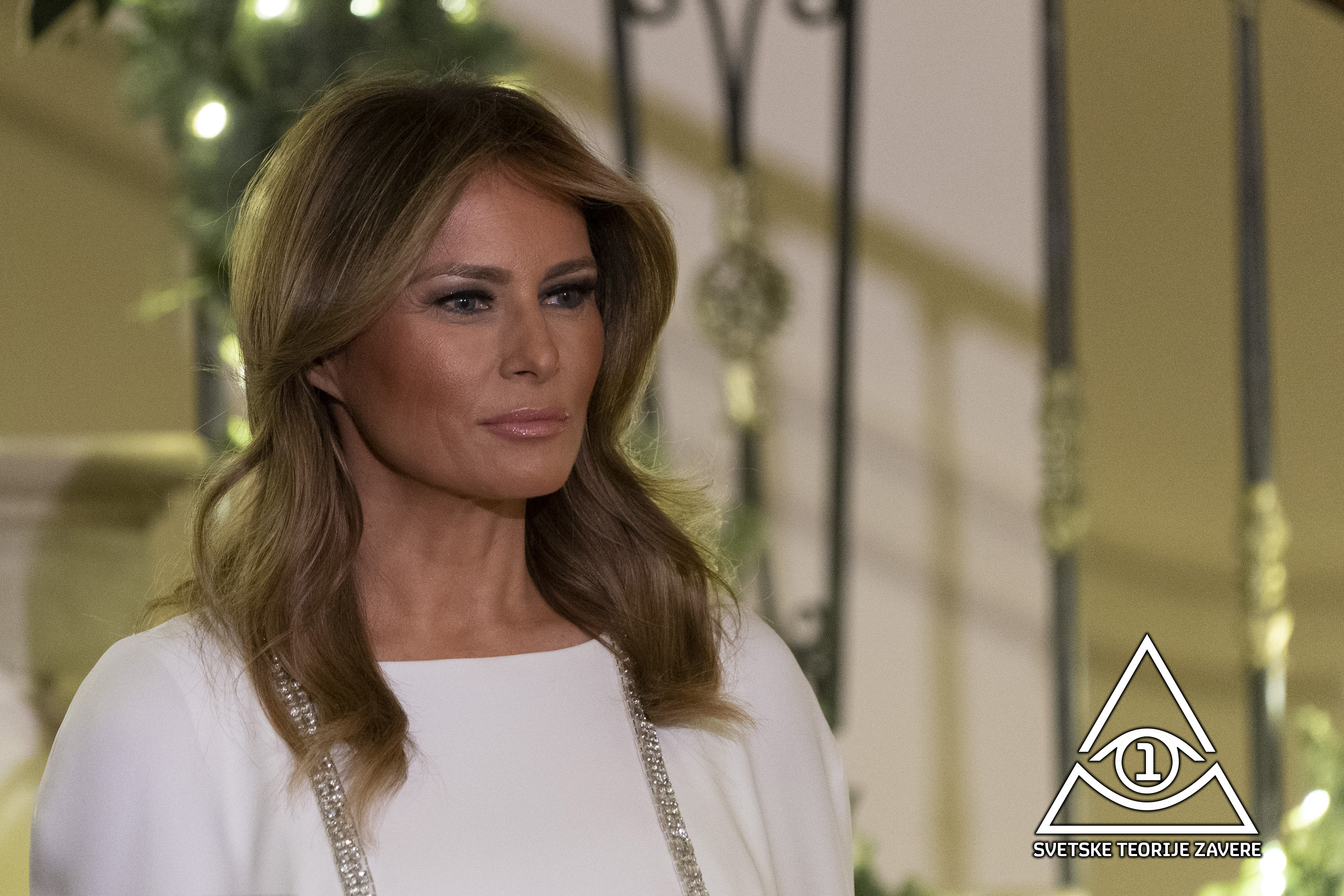 epa08067209 First lady Melania Trump listens as United States President Donald J. Trump (not pictured) makes remarks at the Congressional Ball at the White House in Washington, DC, USA, 12 December 2019.  EPA-EFE/CHRIS KLEPONIS / POOL