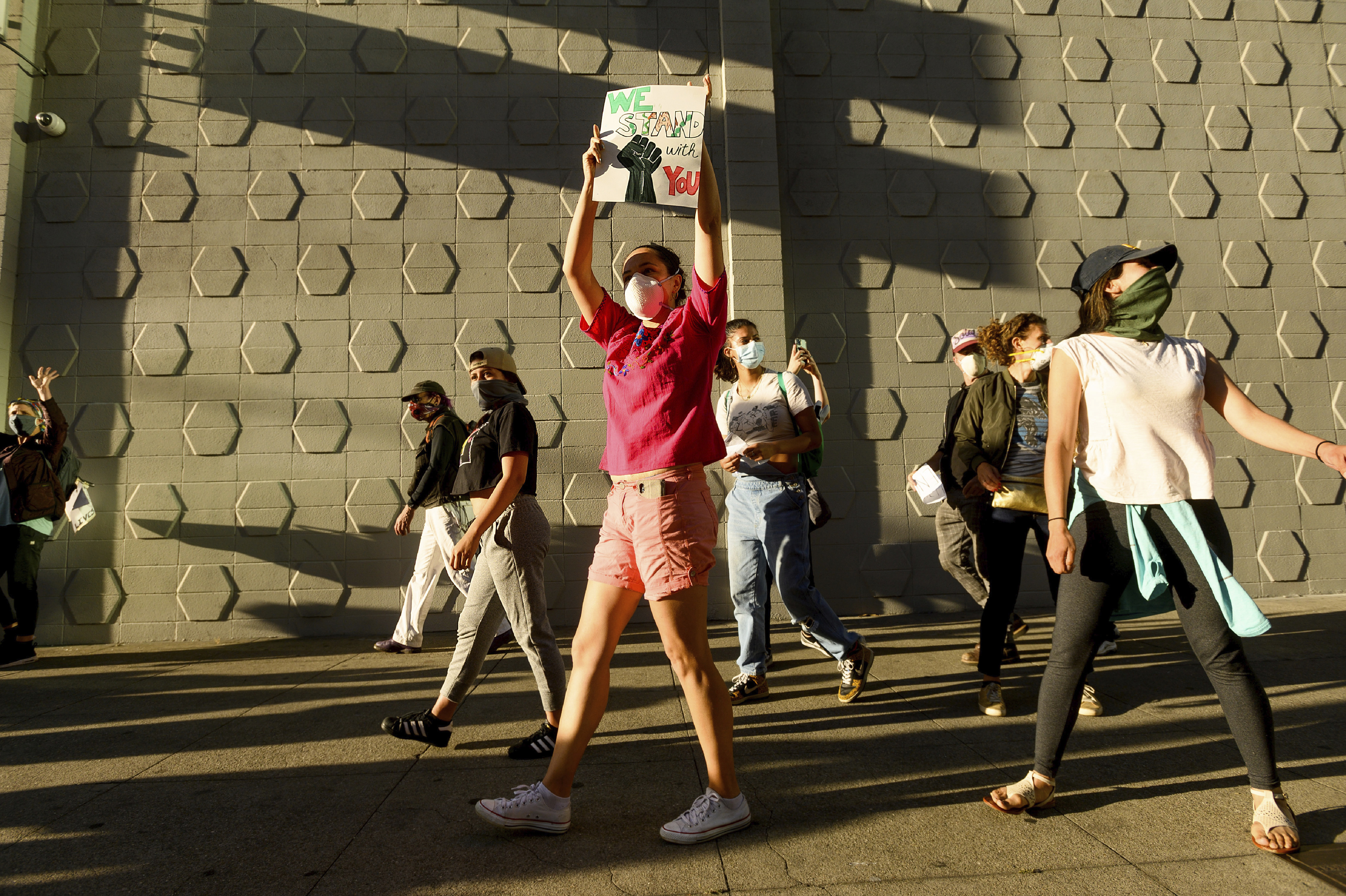 Demonstrators rally in Oakland, Calif., on Monday, June 1, 2020, to protest the death of George Floyd, who died after being restrained by Minneapolis police officers on May 25. (AP Photo/Noah Berger)