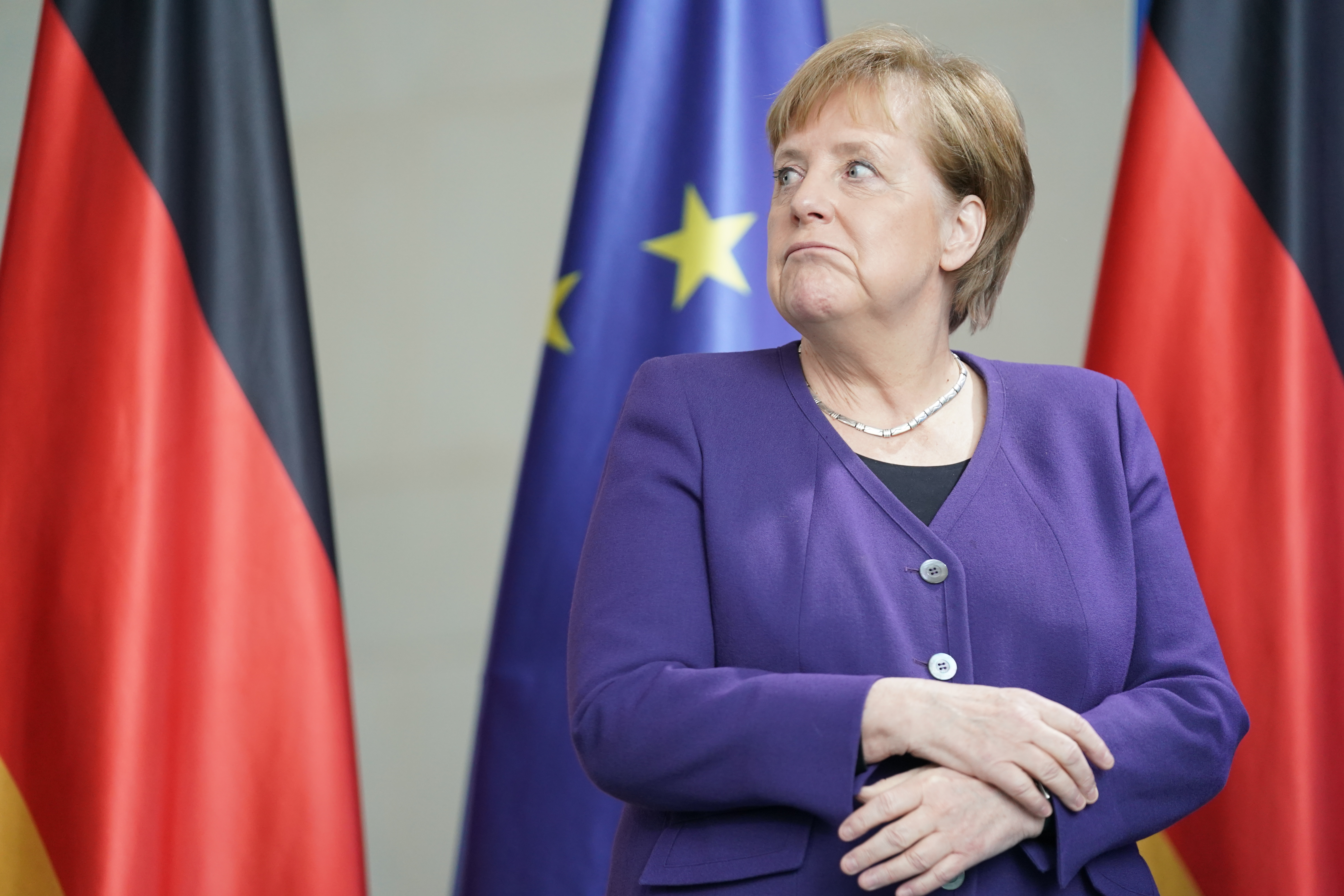 Angela Merkel epa08217129 German Chancellor Angela Merkel attends  the presentation of the two Euro special coin 2020 'Brandenburg' in Berlin, Germany, 14 February 2020.  EPA-EFE/ALEXANDER BECHER