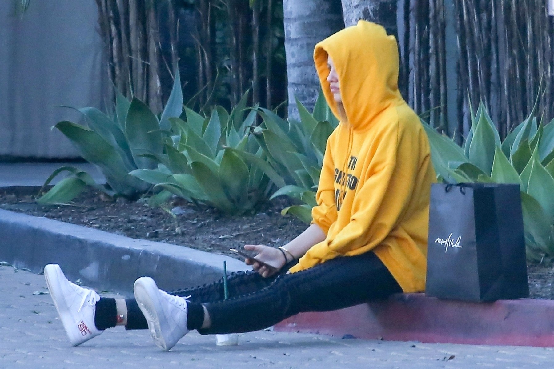 Malibu, CA  - *EXCLUSIVE*  - French model Thylane Blondeau and French DJ Milane Meritte were seen showing some PDA while out grabbing lunch with friends at Lumber Yard Mall in Malibu.