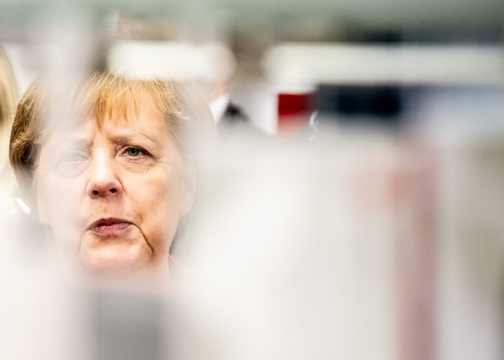Angela Merkel epa08192955 German Chancellor Angela Merkel looks on during a visit to the biotechnological centre in Greifswald, Northen Germany, Germany 04 February 2020.  EPA-EFE/FILIP SINGER