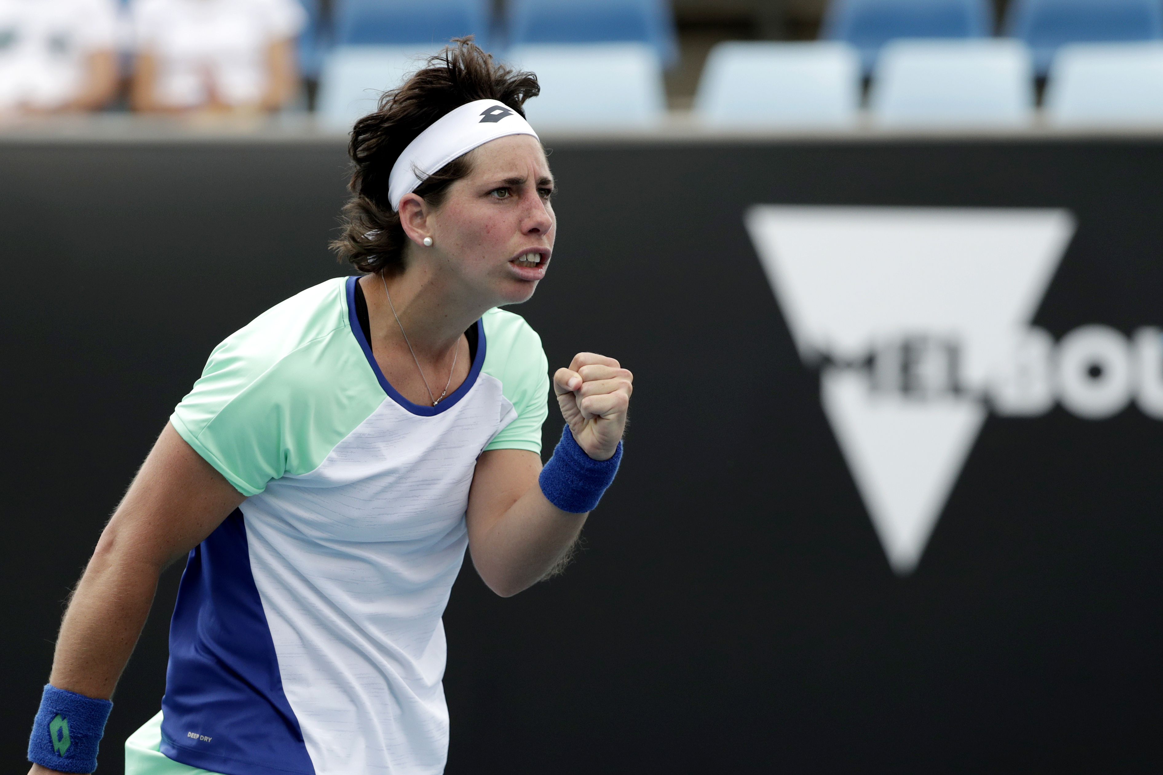epa08149163 Carla Suarez Navarro of Spain in action during her women's singles second round match against Aryna Sabalenka of Belarus at the Australian Open Grand Slam tennis tournament in Melbourne, Australia, 22 January 2020. EPA-EFE/LYNN BO BO