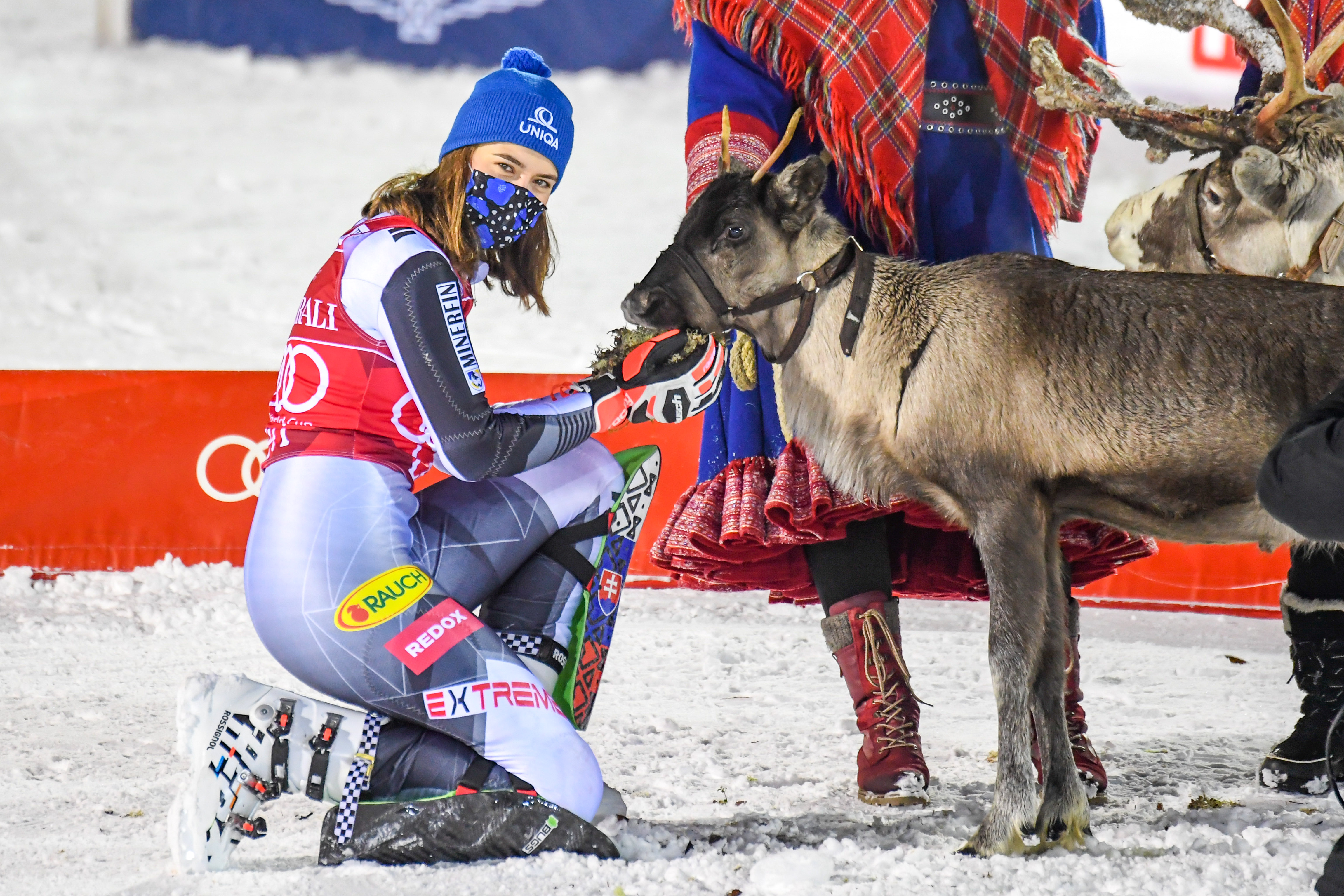 epa08835717 Petra Vlhova of Slovakia celebrates with a reindeer after winning the Women's Slalom race at the FIS Alpine Skiing World Cup in Levi, Finland, 22 November 2020.  EPA-EFE/KIMMO BRANDT