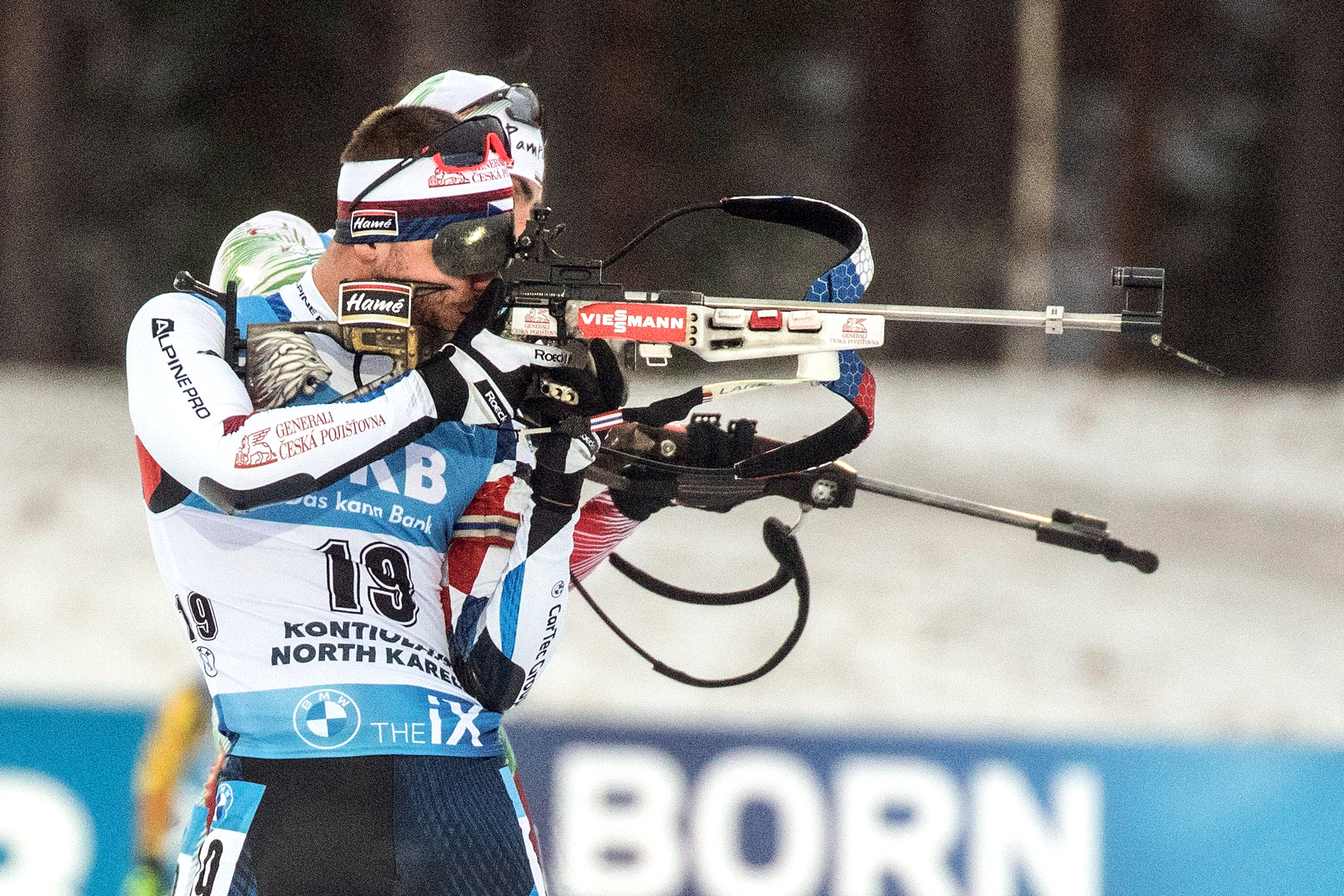 epa08848328 Michal Krcmar of the Czech Republic takes aim at at the shooting range during the men's 20km individual competition of the IBU Biathlon World Cup in Kontiolahti, Finland, 28 November 2020.  EPA-EFE/MAURI RATILAINEN