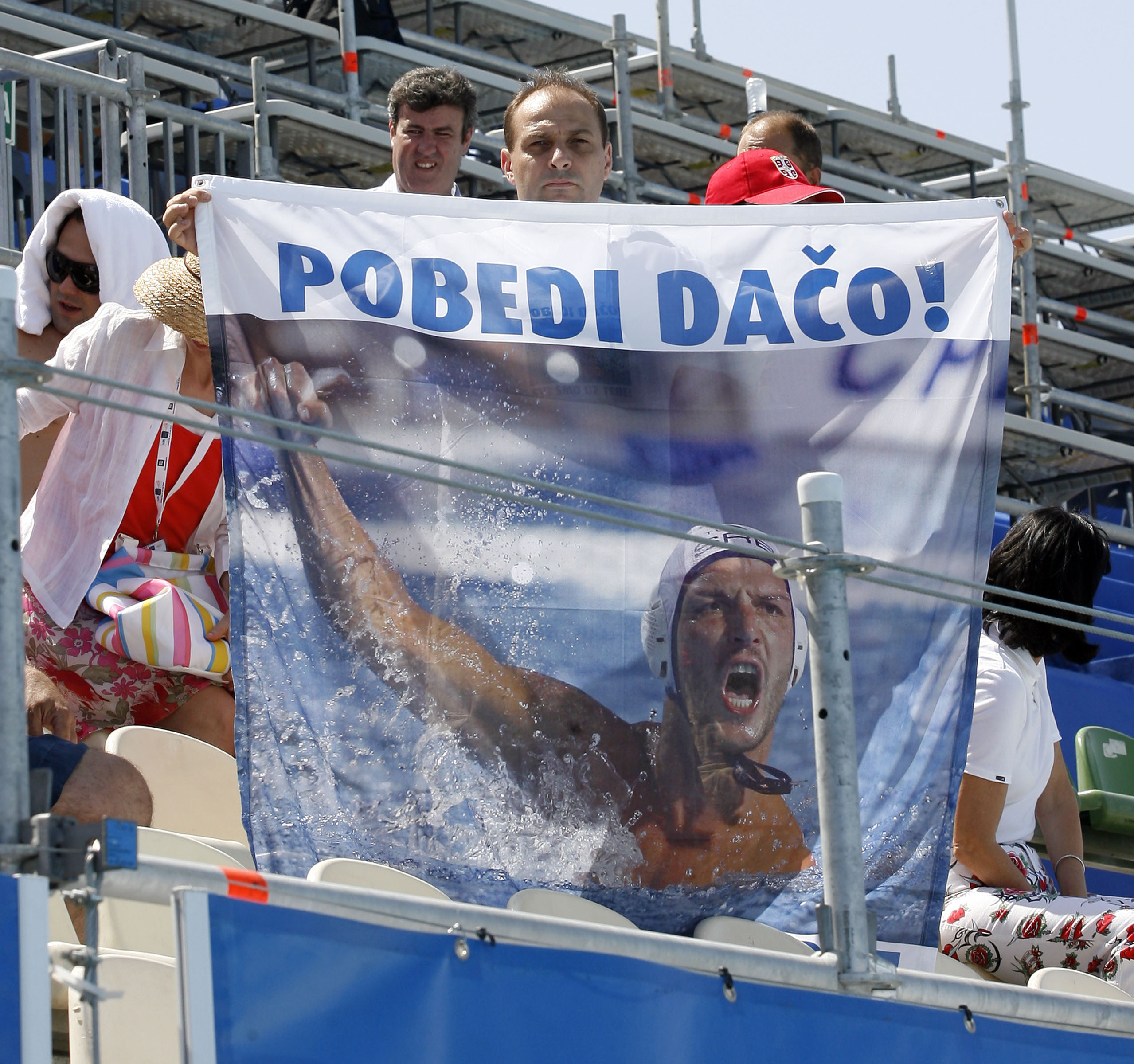 Vaterpolo.Evropsko prvenstvo, Malaga 2008.Srbija (Serbia) Vs. Nemacka (Germany).Velibor Sovrovic, hold a banner with picture of Danilo Daca Ikodinovic.Malaga, 04.07.2008.foto: Srdjan Stevanovic
