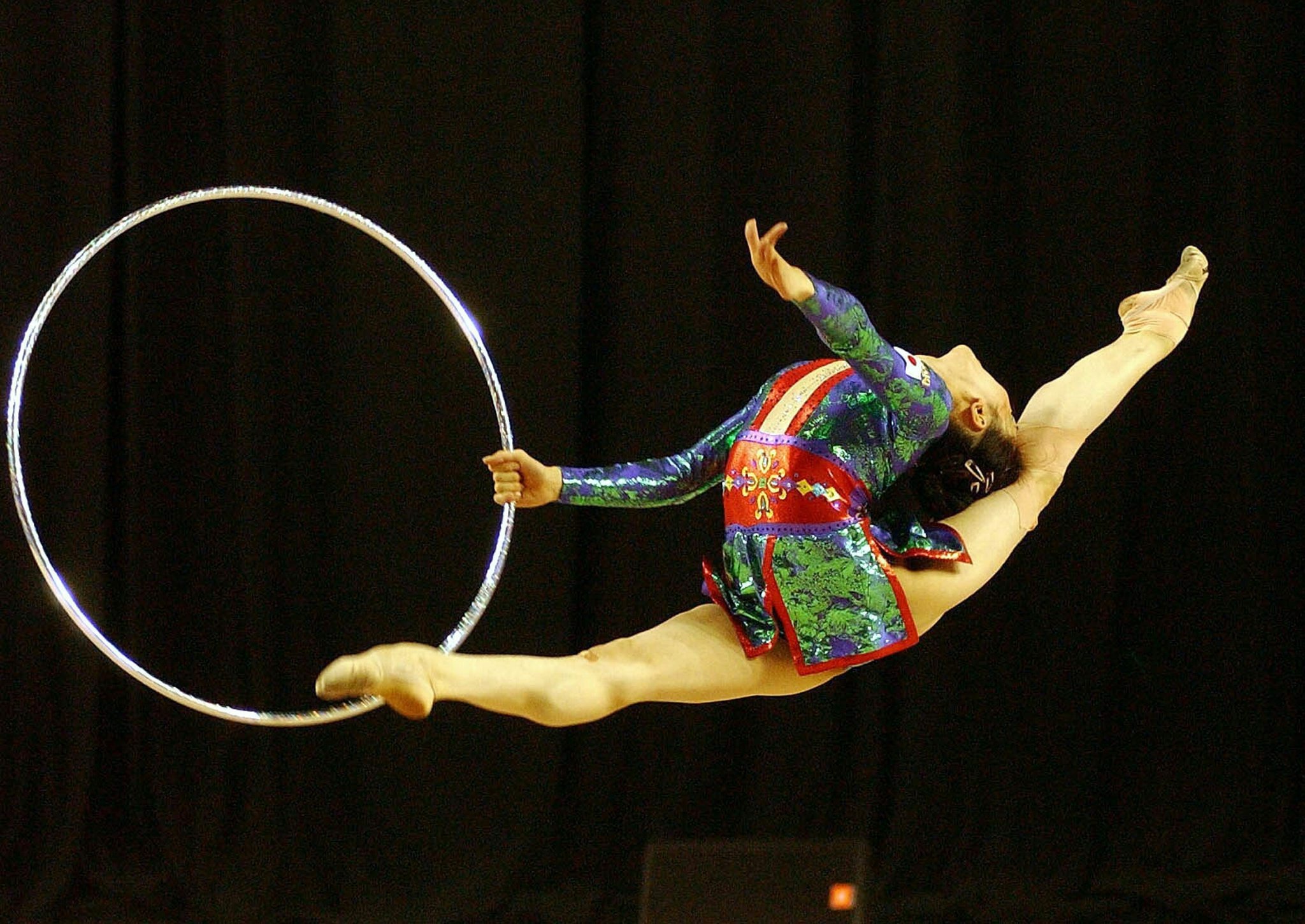 Yachio Nakamura of Japan performs her hoop routine