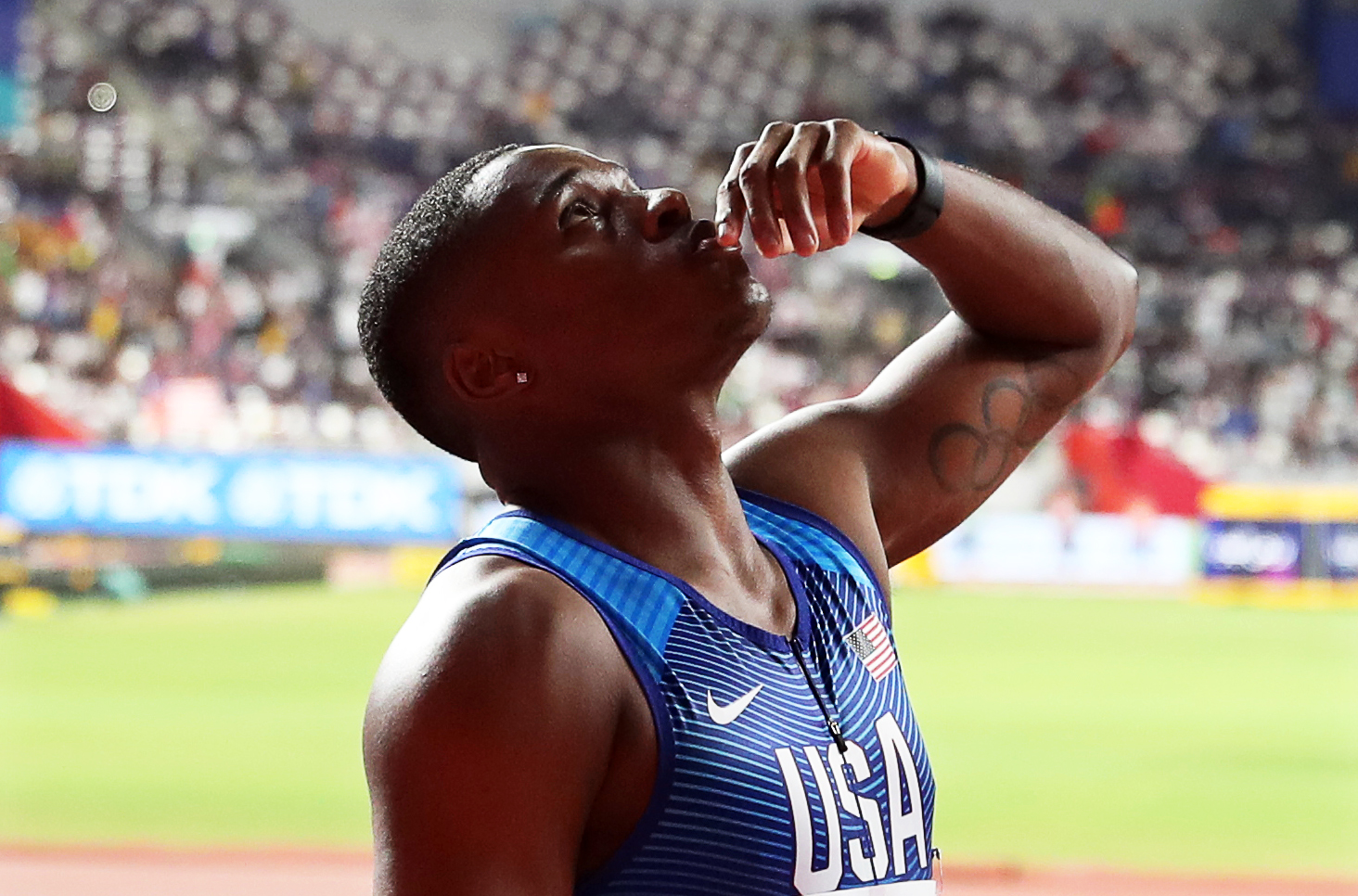 epa07899594 Christian Coleman of the USA prepares to compete in the men's 4x100m Relay final at the IAAF World Athletics Championships 2019 at the Khalifa Stadium in Doha, Qatar, 05 October 2019. The US relay team won the race. EPA-EFE/YAHYA ARHAB