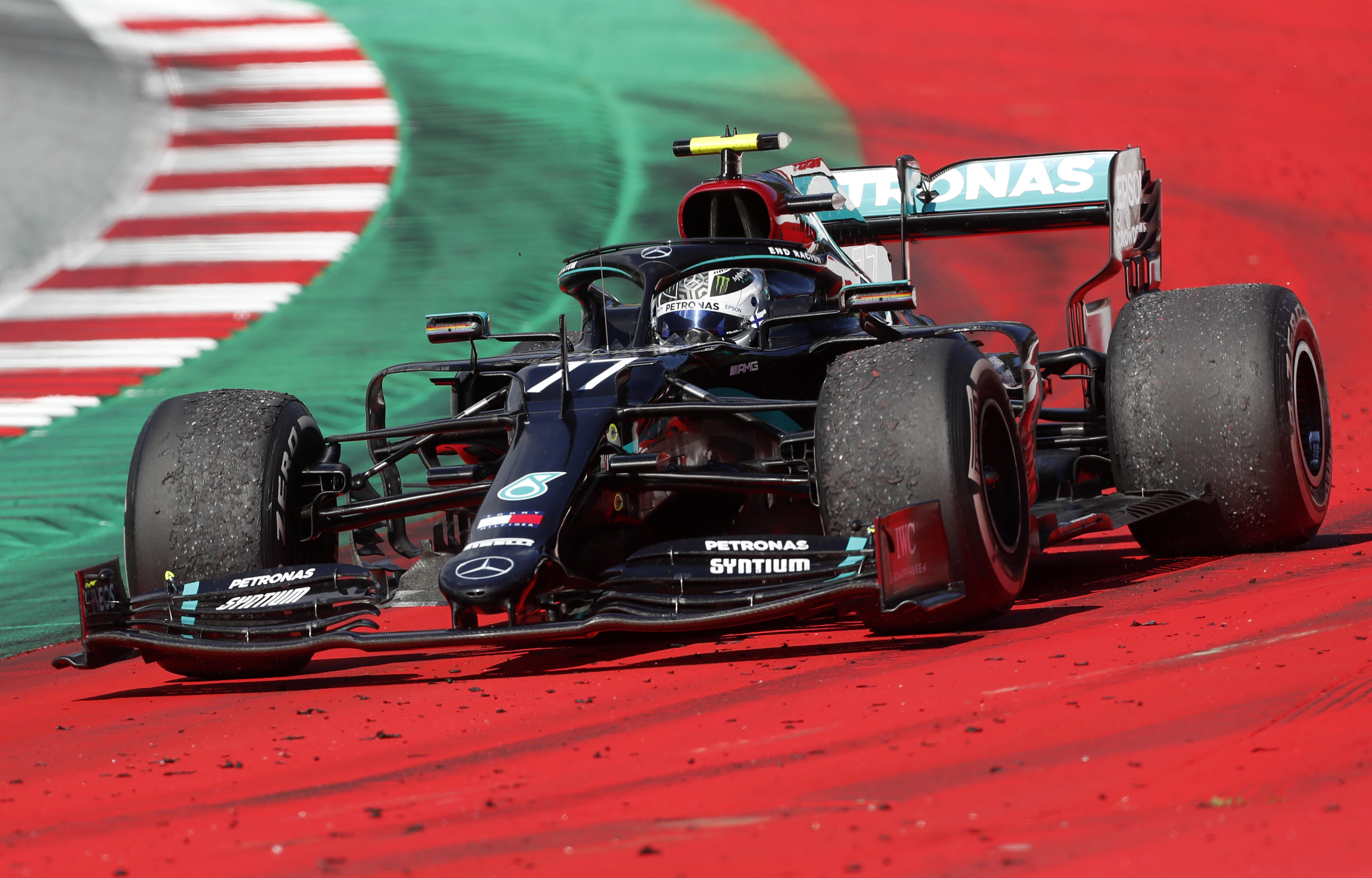 Race winner Mercedes driver Valtteri Bottas of Finland steers his car after the Austrian Formula One Grand Prix at the Red Bull Ring racetrack in Spielberg, Austria, Sunday, July 5, 2020. (AP Photo/Darko Bandic)