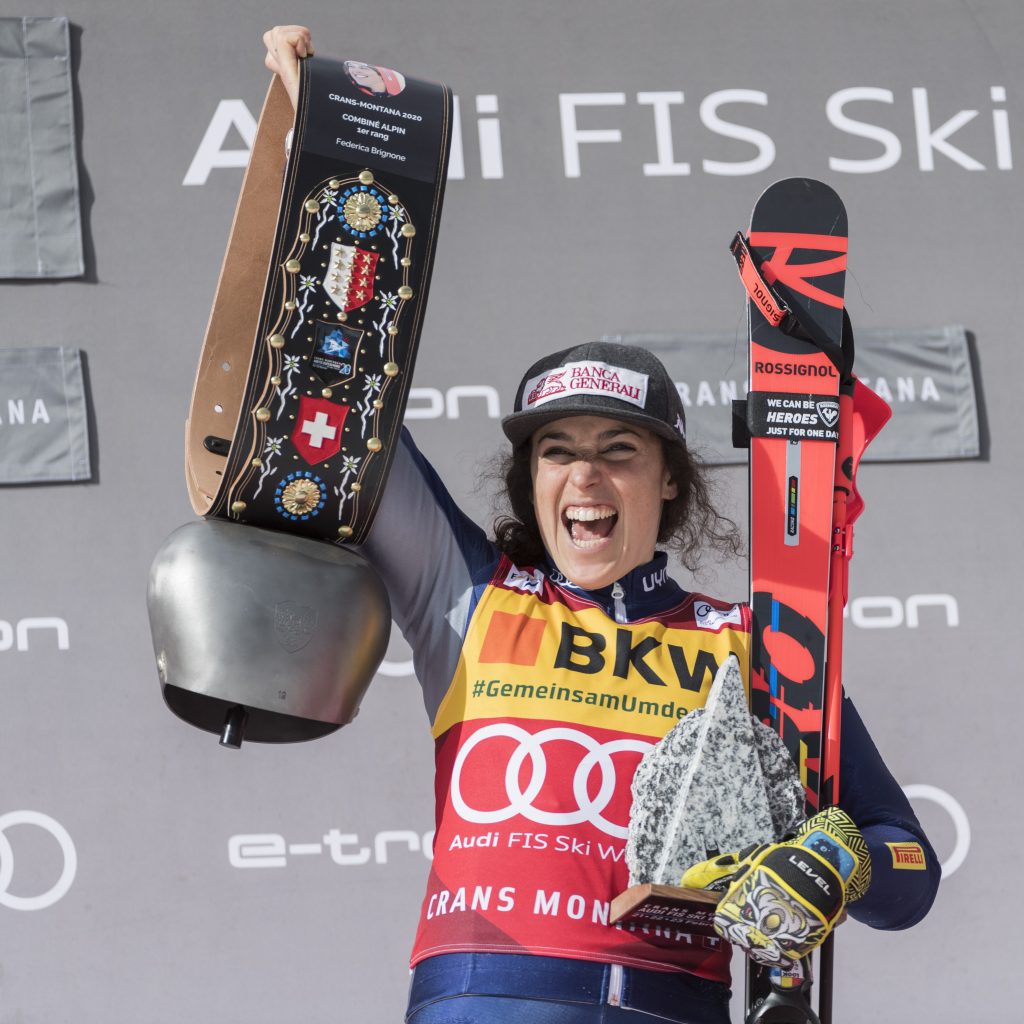 epa08240712 Winner Federica Brignone from Italy celebrates during the podium ceremony for the Women's Alpine Combined competition at the FIS Alpine Skiing World Cup in Crans-Montana, Switzerland, 23 February 2020.  EPA-EFE/ALESSANDRO DELLA VALLE