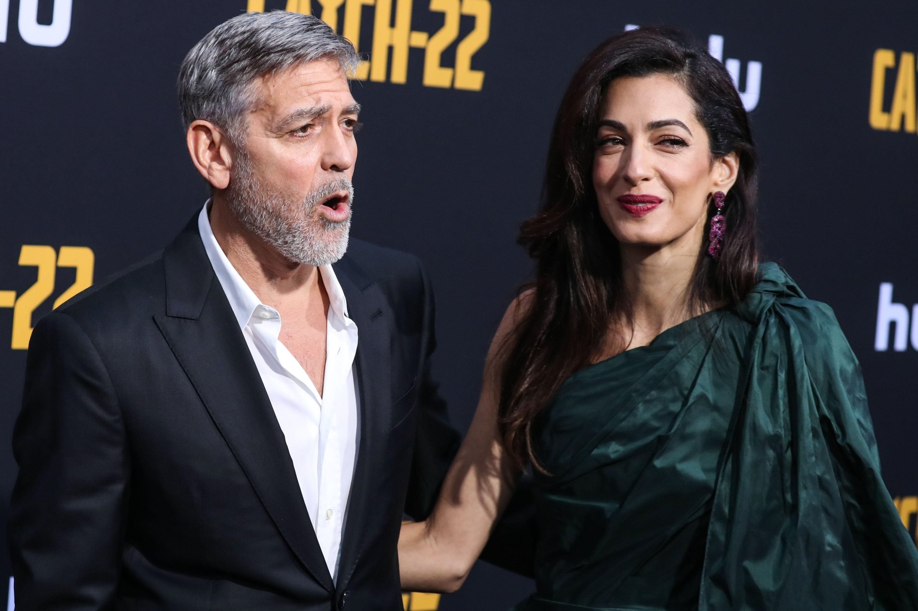 Hollywood, United States. 07th May, 2019. HOLLYWOOD, LOS ANGELES, CALIFORNIA, USA - MAY 07: Actor George Clooney and wife/barrister Amal Alamuddin Clooney (wearing an Oscar de la Renta dress) arrive at the Los Angeles Premiere Of Hulu's 'Catch-22' held at