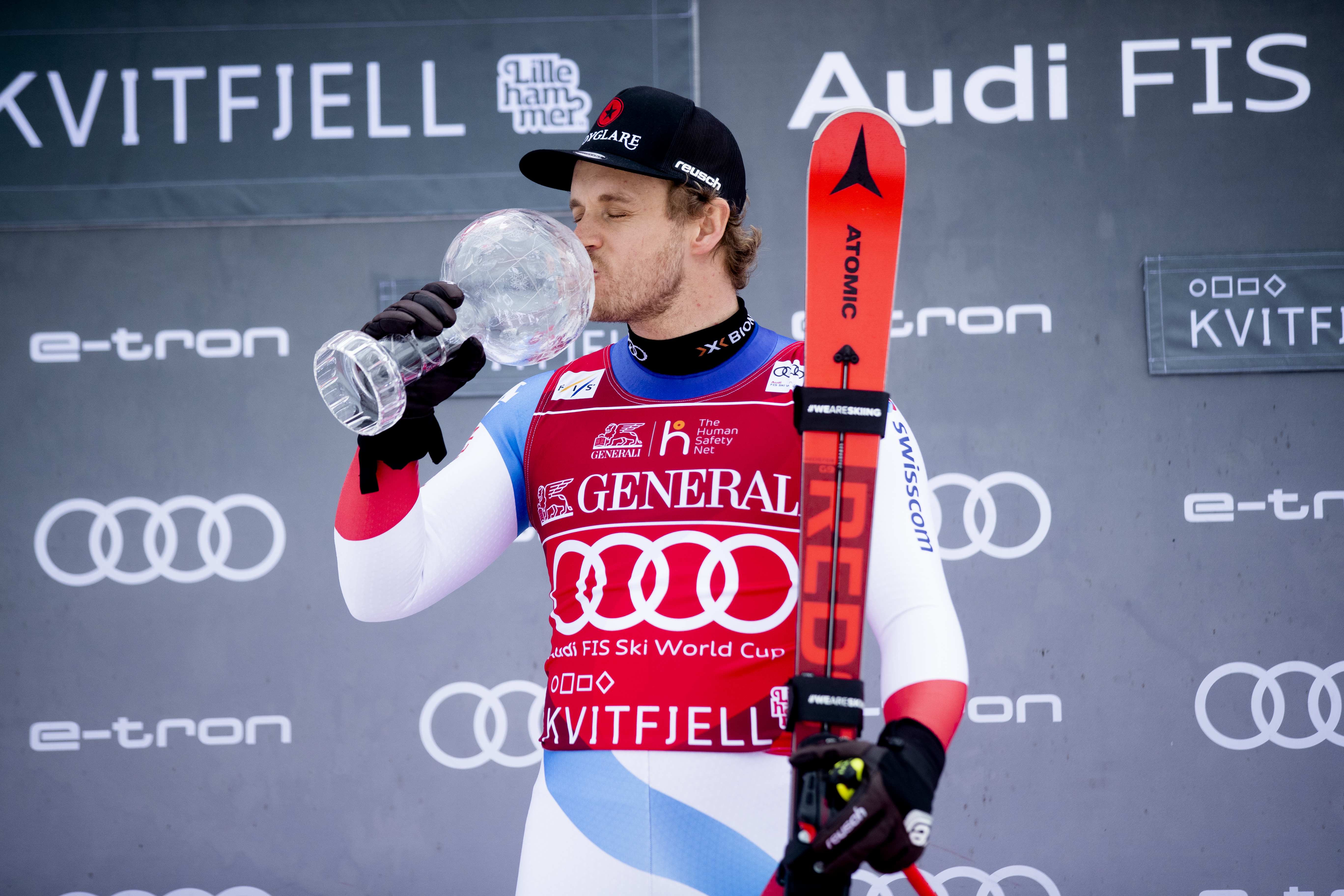 epa08277911 Mauro Caviezel from Switzerland, the winner of the Super-G Overall World Cup, kisses his Crystal Ball at an award ceremony after the World Cup in Super-G was canceled in Kvitfjell, Norway, 08 March 2020.  EPA-EFE/Stian Lysberg Solum NORWAY OUT