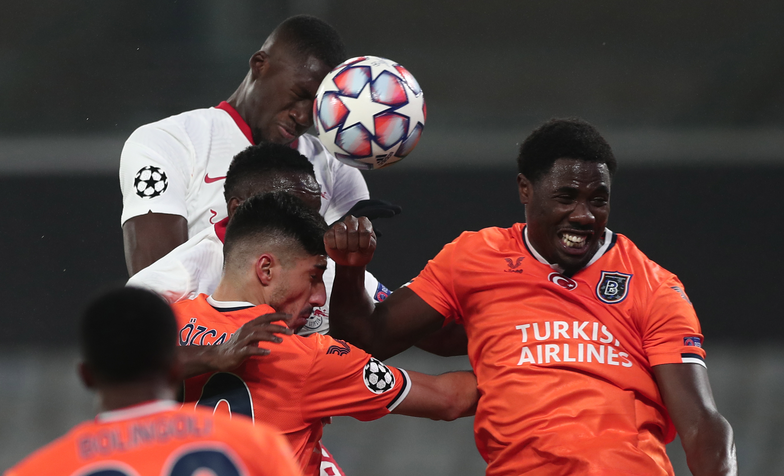 epa08857566 Carlos Ponck (R) of Basaksehir in action against Dayot Upamecano (top-L) of Leipzig during the UEFA Champions League group H soccer match between Istanbul Basaksehir and RB Leipzig in Istanbul, Turkey, 02 December 2020.  EPA-EFE/SEDAT SUNA