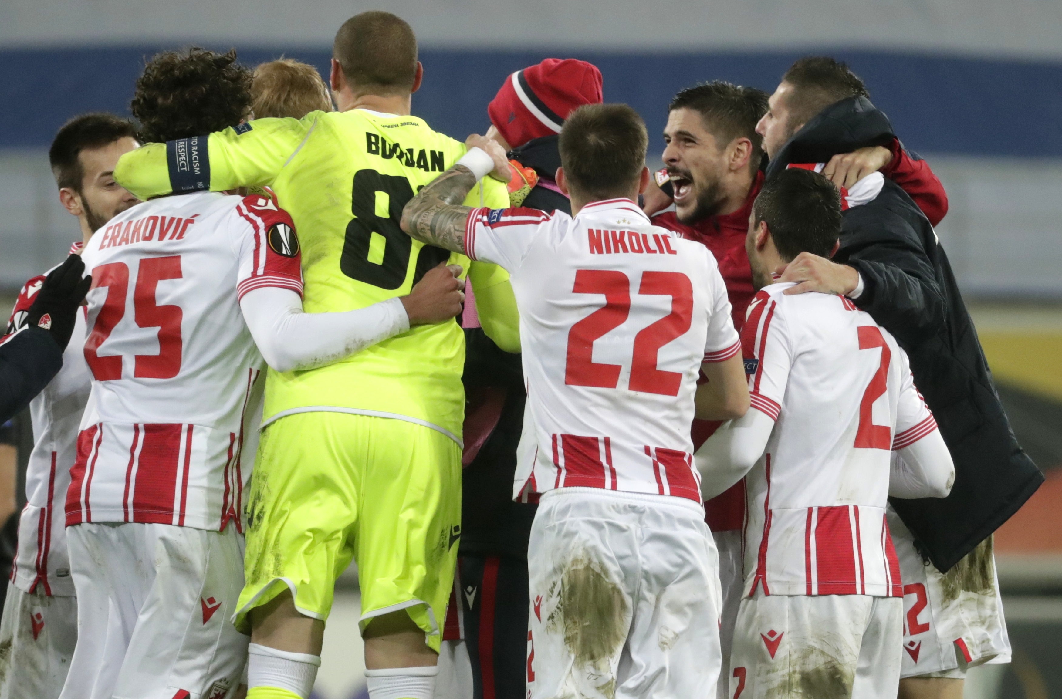 epa08844723 Players of Red Star celebrate after the UEFA Europa League Group L match between KAA Gent and Red Star Belgrade in Gent, Belgium, 26 November 2020.  EPA-EFE/STEPHANIE LECOCQ