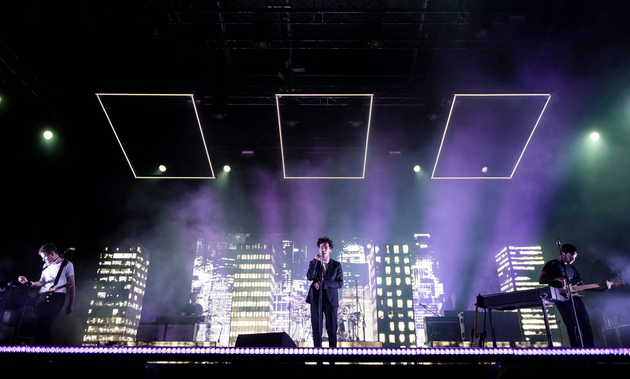 epa05535496 (L-R): Gitarrist Adam Hann, singer Matthew Healy and bassist Ross MacDonald of the band 'The 1975' performs at the Lollapalooza Festival in Berlin, Germany, 11 September 2016. The event runs until 11 September.  EPA/GREGOR FISCHER