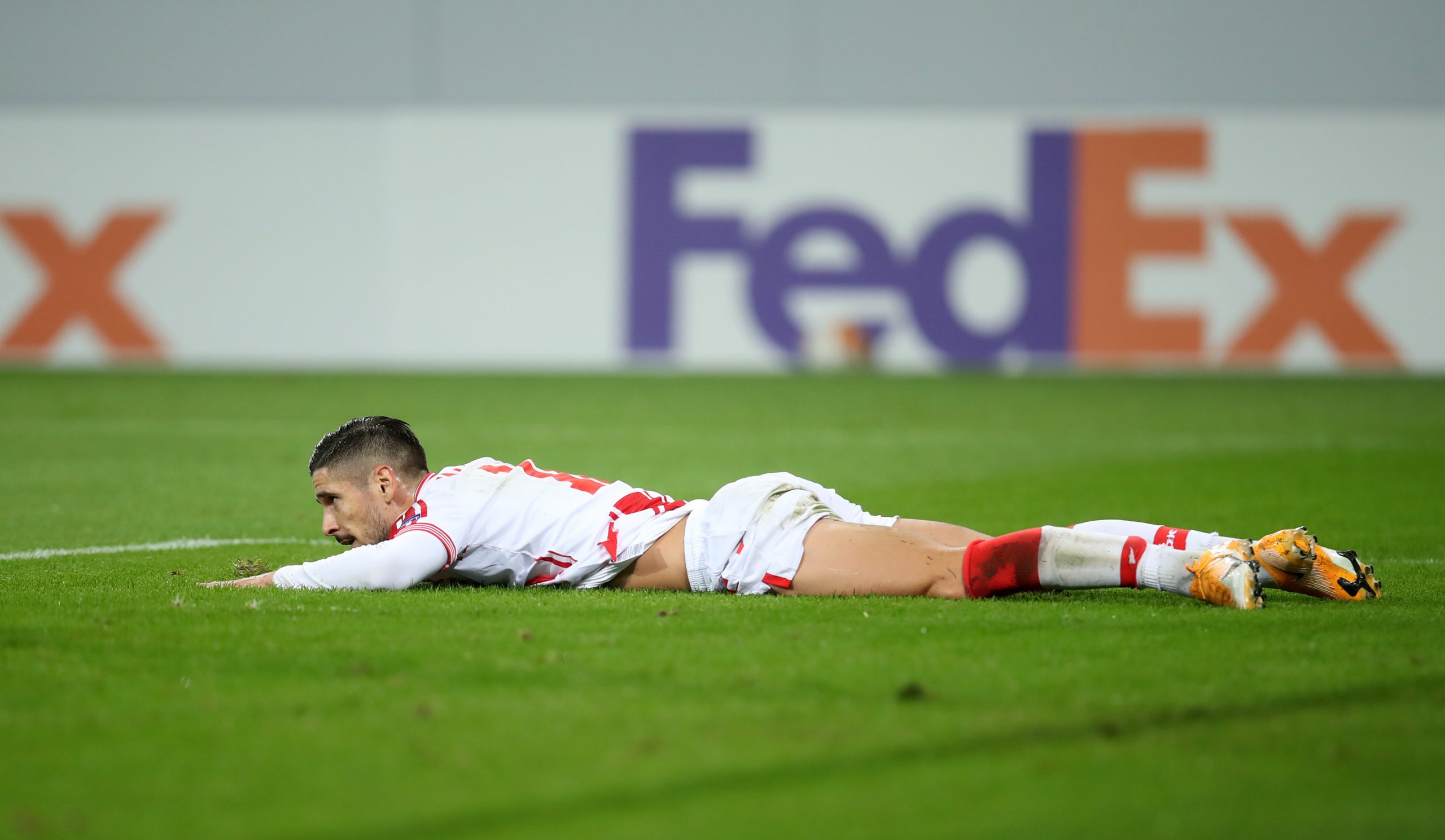 epa08766170 Diego Falcinelli of Crvena Zvezda reacts during the UEFA Europa League Group L soccer match between TSG Hoffenheim and Crvena Zvezda at PreZero-Arena in Sinsheim, Germany, 22 October 2020.  EPA-EFE/Alex Grimm / POOL