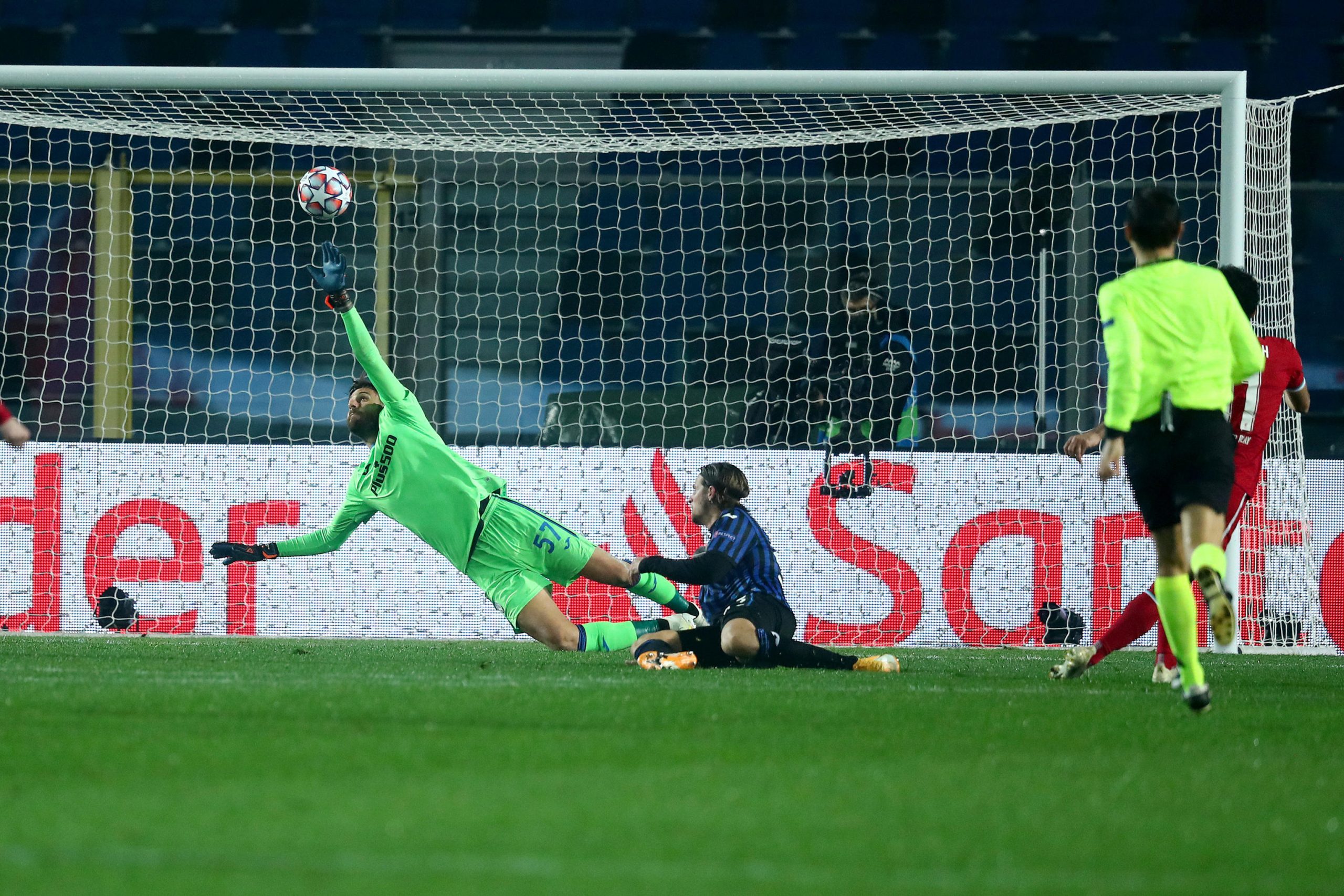 epa08796829 Liverpool's Mohamed Salah scores the goal 0-3 during the UEFA Champions League Group D soccer match Atalanta BC vs Liverpool at Gewiss Stadium in Bergamo, Italy, 03 November 2020.  EPA-EFE/PAOLO MAGNI