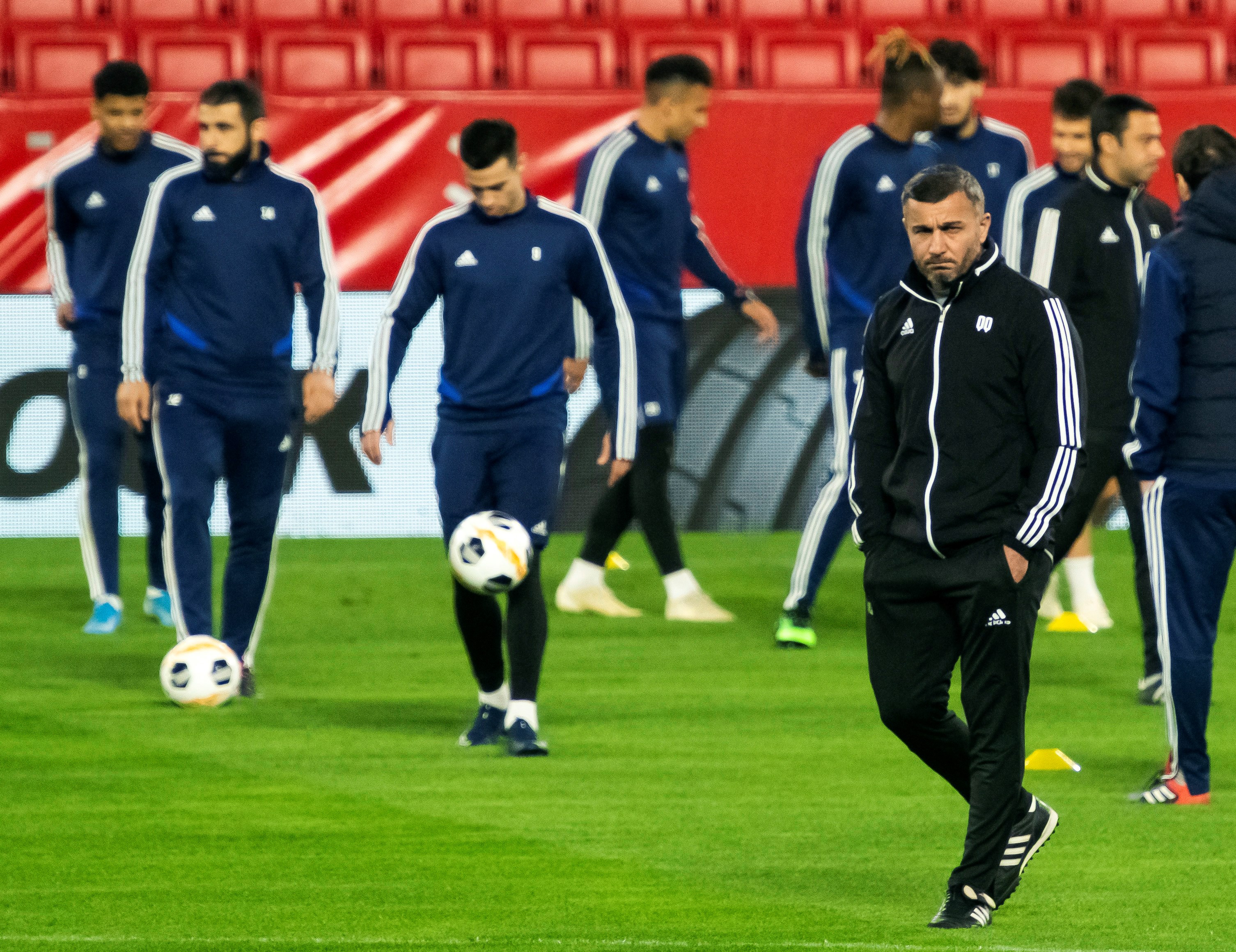 epa08029535 Qarabak FK's head coach Gurban Gurbanov (R) leads a training session of the team in Seville, Spain, 27 November 2019. Qarabag FK will face Sevilla FC in a UEFA Europa League Group Stage soccer match on 28 November.  EPA-EFE/Raul Caro