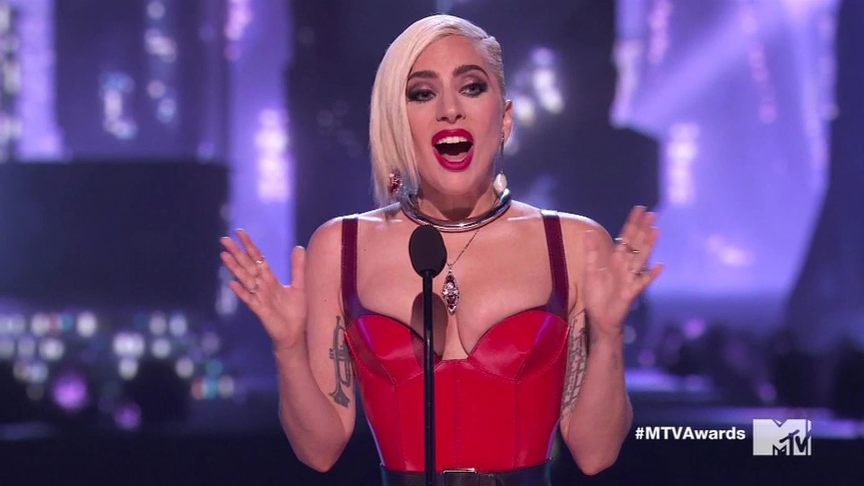 Lady Gaga thanks her 'little monsters' fans as she makes surprise appearance at the MTV Movie &amp; TV Awards