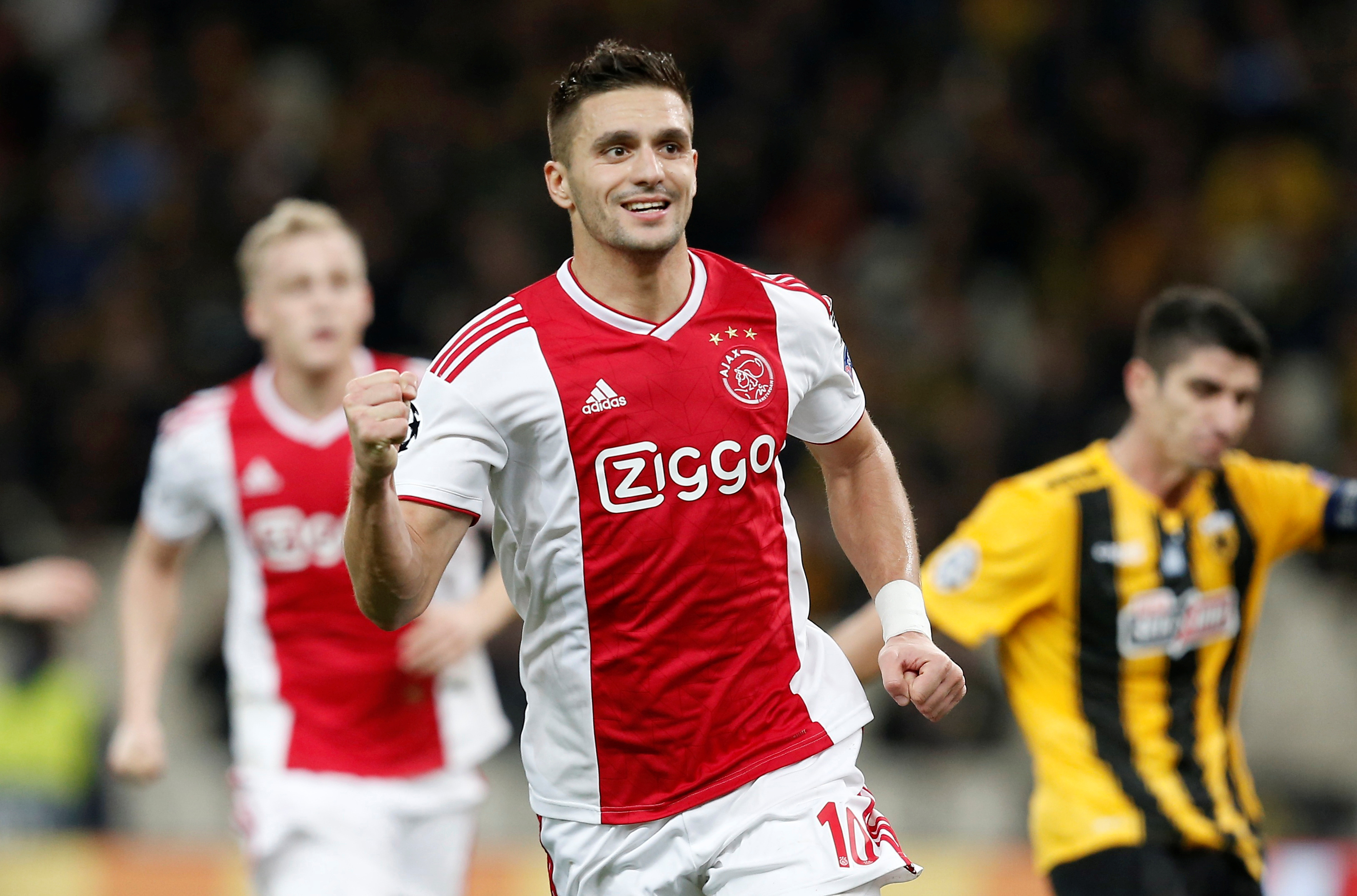 Soccer Football - Champions League - Group Stage - Group E - AEK Athens v Ajax Amsterdam - OAKA Spiros Louis, Athens, Greece - November 27, 2018  Ajax's Dusan Tadic celebrates scoring their first goal   REUTERS/Costas Baltas - RC1DB03761D0