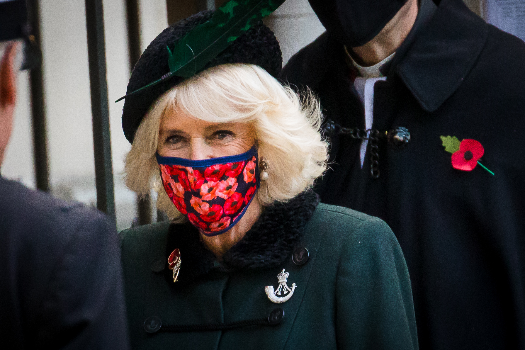 epaselect epa08798448 Britain's Camilla, Duchess of Cornwall wears a poppy face mask as she visits Westminster Abbey to attend the 92nd Field of Remembrance in London, Britain, 04 November 2020.  EPA-EFE/VICKIE FLORES