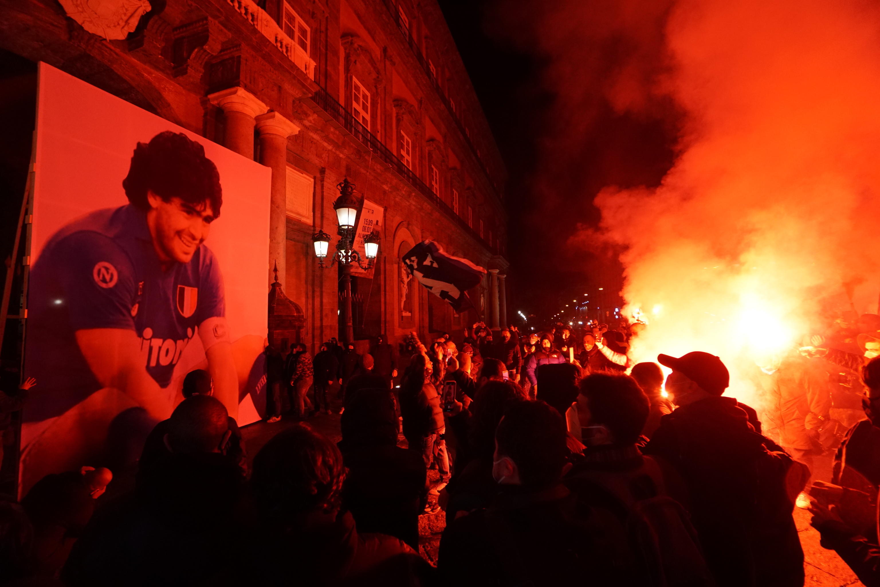 epa08844683 Procession and torchlight of Napoli's supporters in memory of Diego Armando Maradona in Naples, Italy, 26 November 2020. Soccer legend Diego Maradona died on 25 November at the age of 60 after a heart attack.  EPA-EFE/CESARE ABBATE
