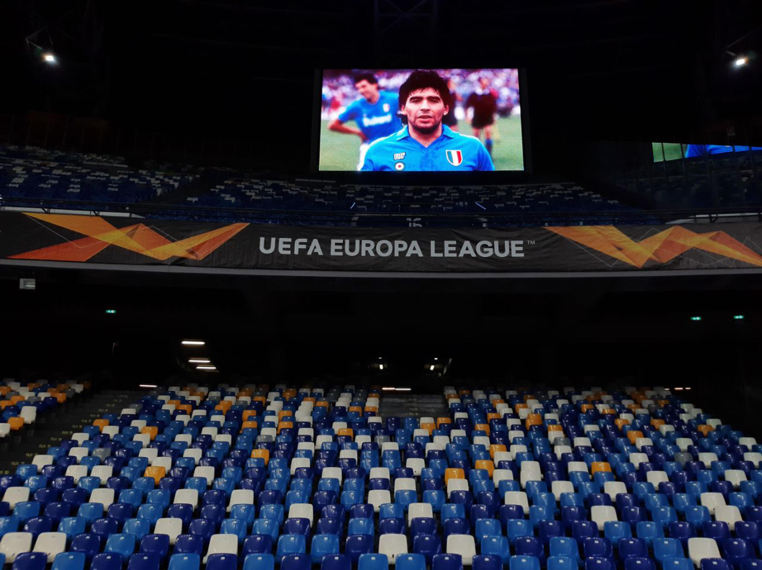 epa08844702 A picture of Diego Maradona is shown on the stadium screen prior to the UEFA Europa League group F soccer match SSC Napoli vs HNK Rijeka at the San Paolo stadium in Naples, Italy, 26 November 2020.  EPA-EFE/CIRO FUSCO