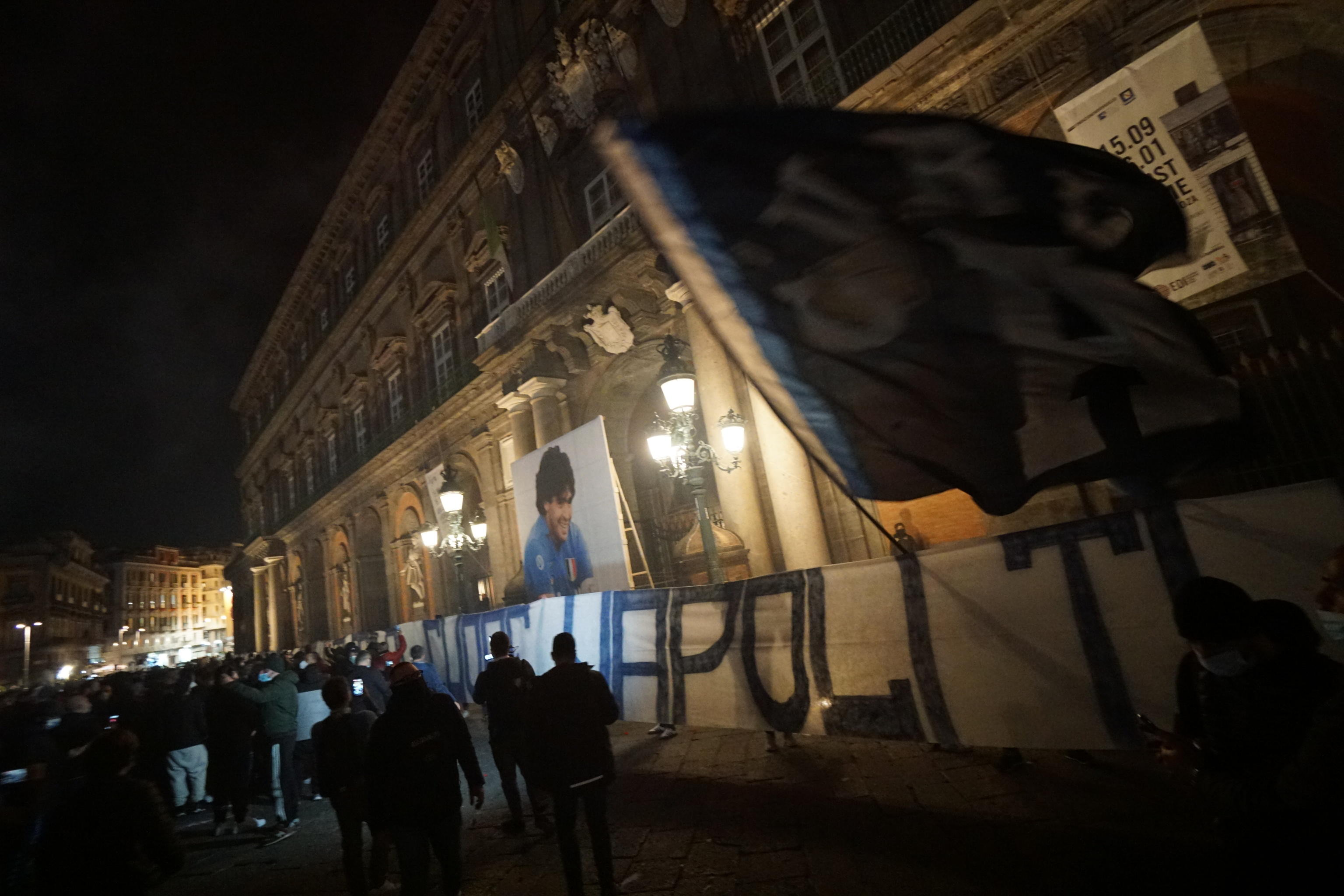 epa08844685 Procession and torchlight of Napoli's supporters in memory of Diego Armando Maradona in Naples, Italy, 26 November 2020. Soccer legend Diego Maradona died on 25 November at the age of 60 after a heart attack.  EPA-EFE/CESARE ABBATE
