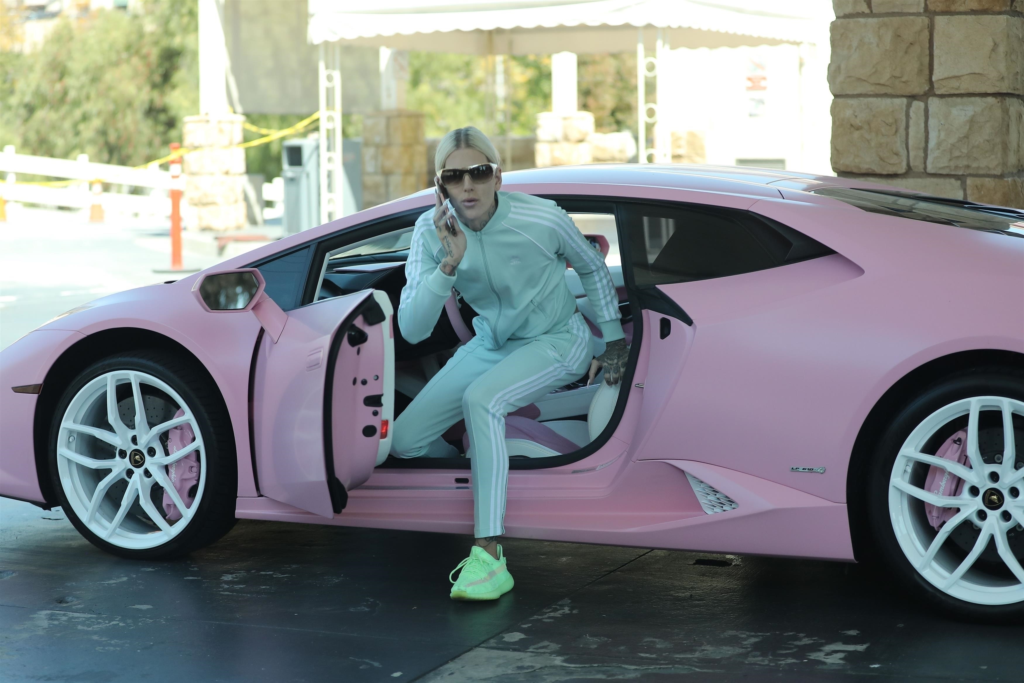 *EXCLUSIVE* Jeffree Star fills up his pink Lamborghini!