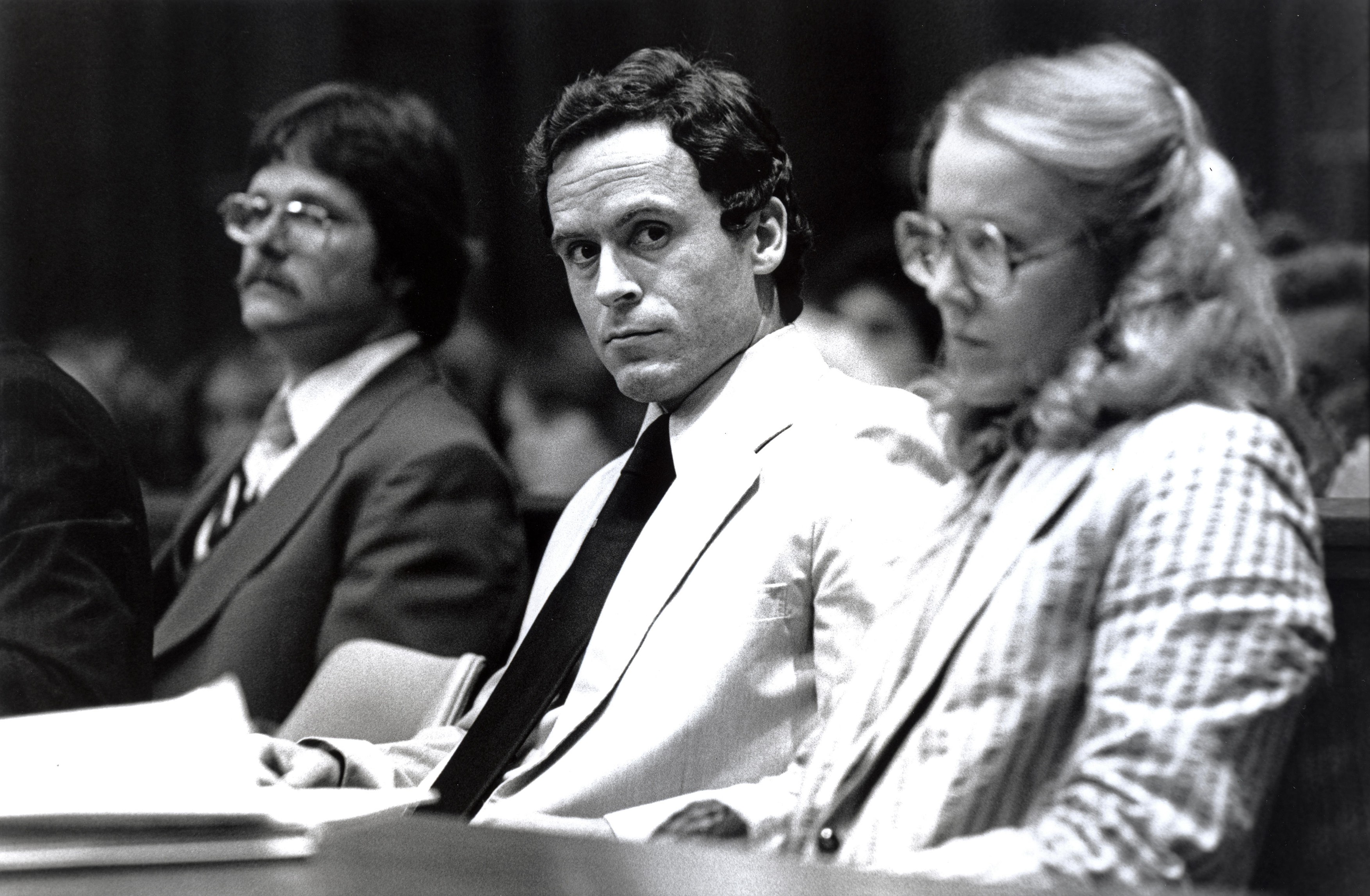 Ted Bundy Murder Trial - Miami - Ted Bundy with defense attorney Margaret Good at the defense table. Theodore Robert Bundy was an American serial killer, kidnapper, rapist, burglar, and necrophile who assaulted and murdered numerous young women and girls