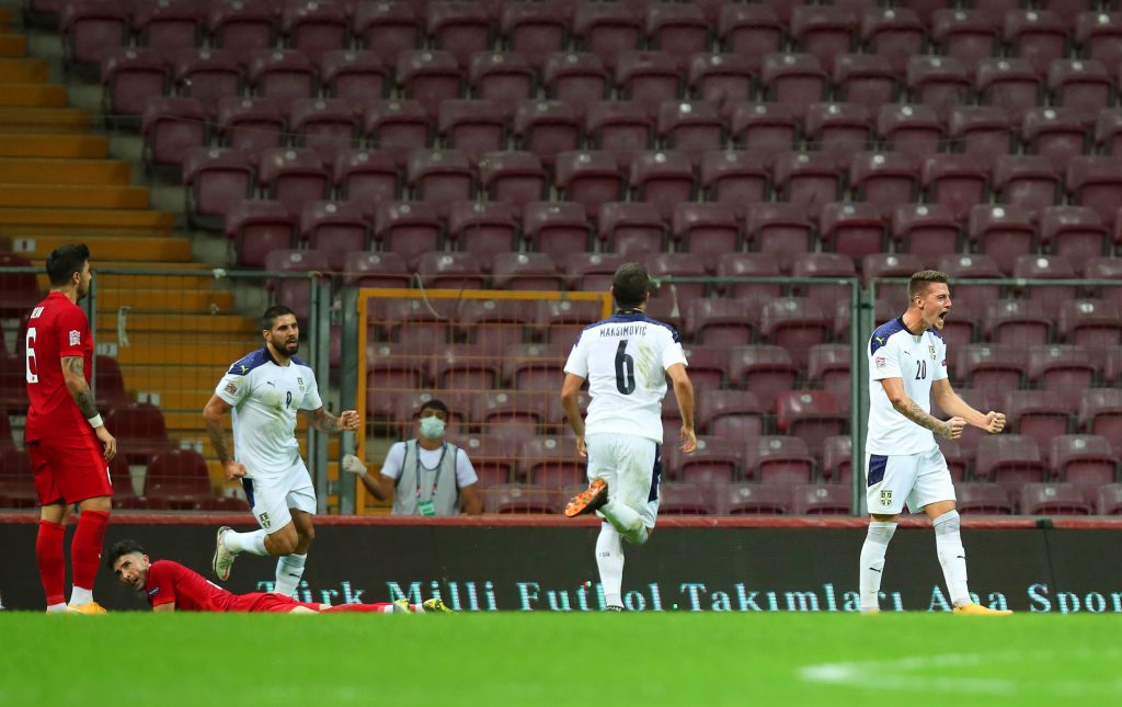 epa08745255 Sergej Milinkovic-Savic (R) of Serbia celebrates after scoring the 1-0 lead during the UEFA Nations League soccer match between Turkey and Serbia in Istanbul, Turkey, 14 October 2020.  EPA-EFE/TOLGA BOZOGLU