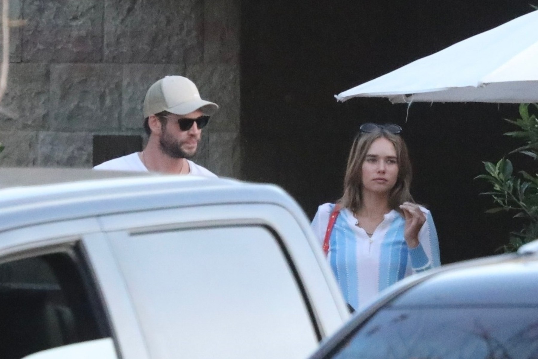 *EXCLUSIVE* Liam Hemsworth leaves a restaurant with Gabriella Brooks in Malibu