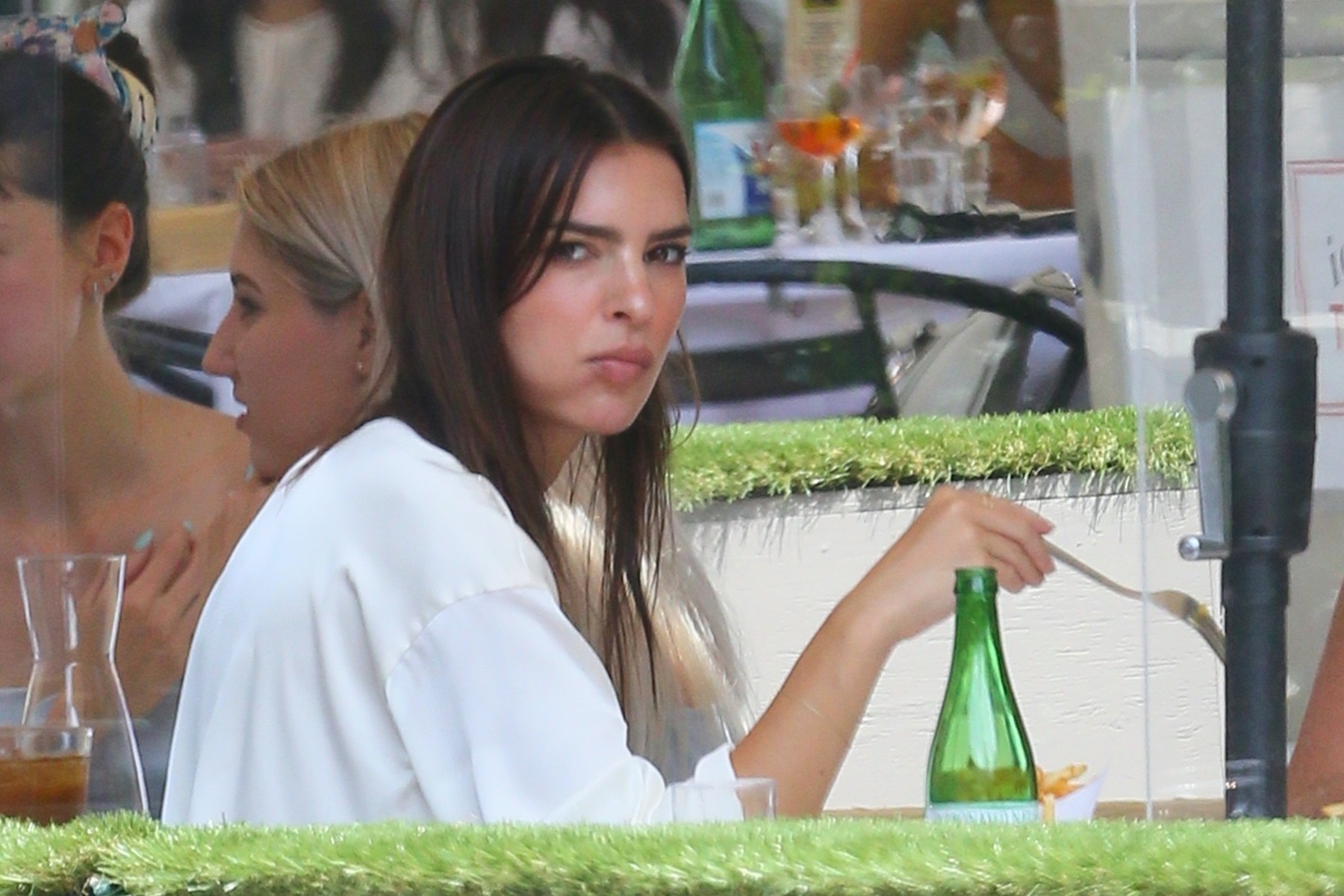 Emily Ratajkowski heads to lunch at the Odeon with a friend