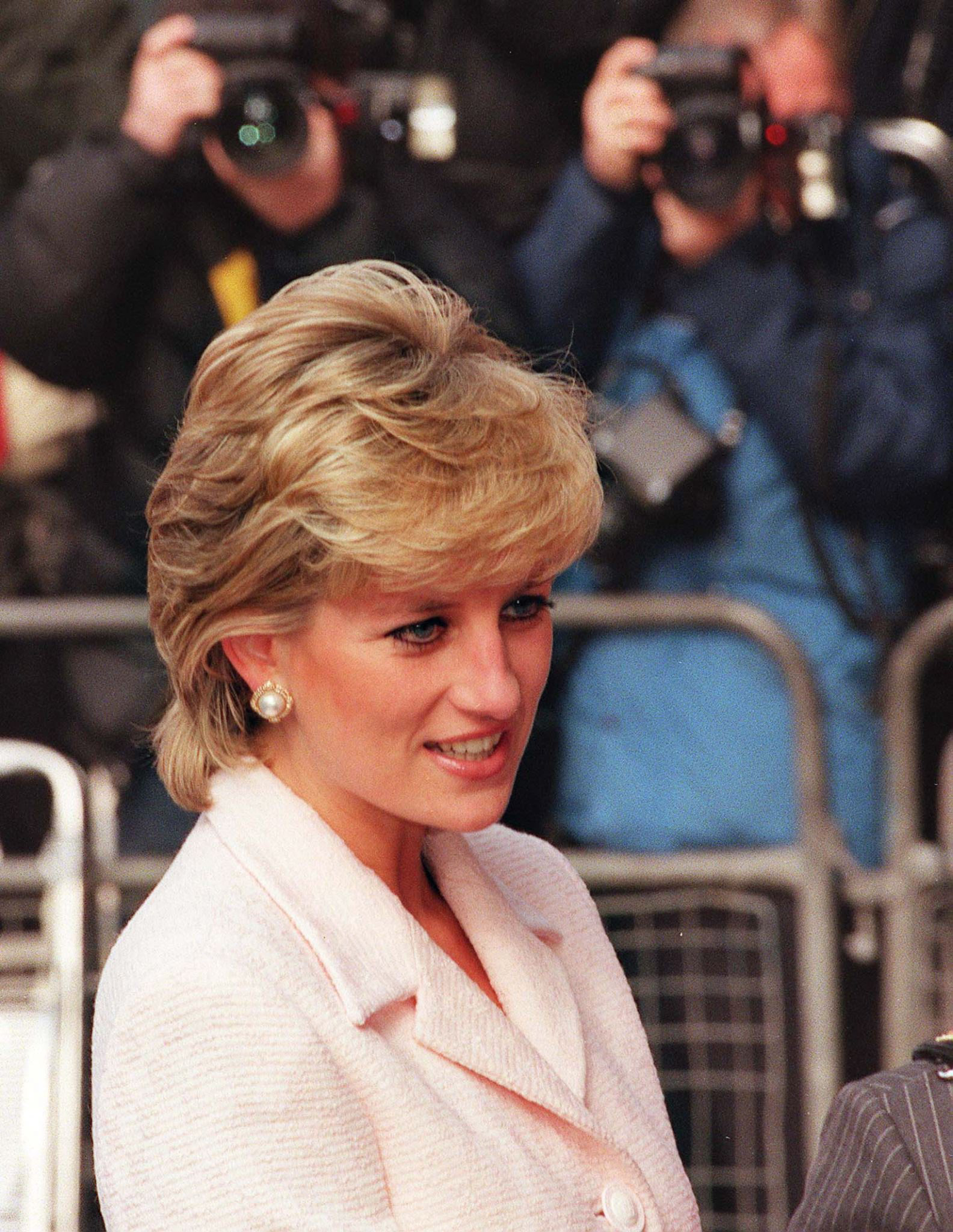 FILES- File picture dated 06 March 1996 showing Lady Diana arriving in a London hospital sdurrounded by photographers for a charity visit. Lady Diana died 31 August in Paris in a car crash.