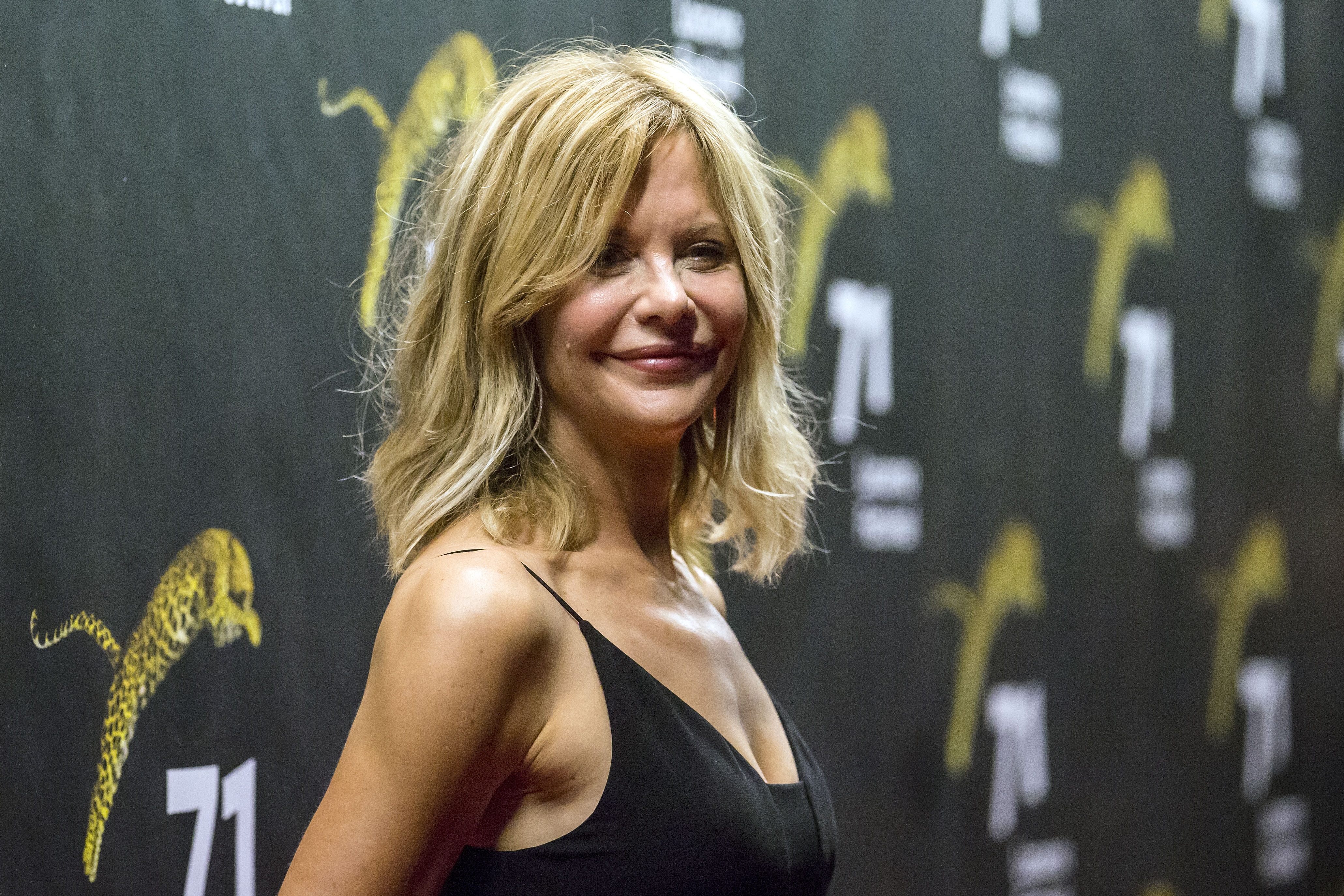 epa06926215 US actress Meg Ryan poses on the red carpet during the 71st Locarno International Film Festival, in Locarno, Switzerland, 03 August 2018. The Festival del film Locarno 2018 runs from 01 to 11 August.  EPA-EFE/ALEXANDRA WEY