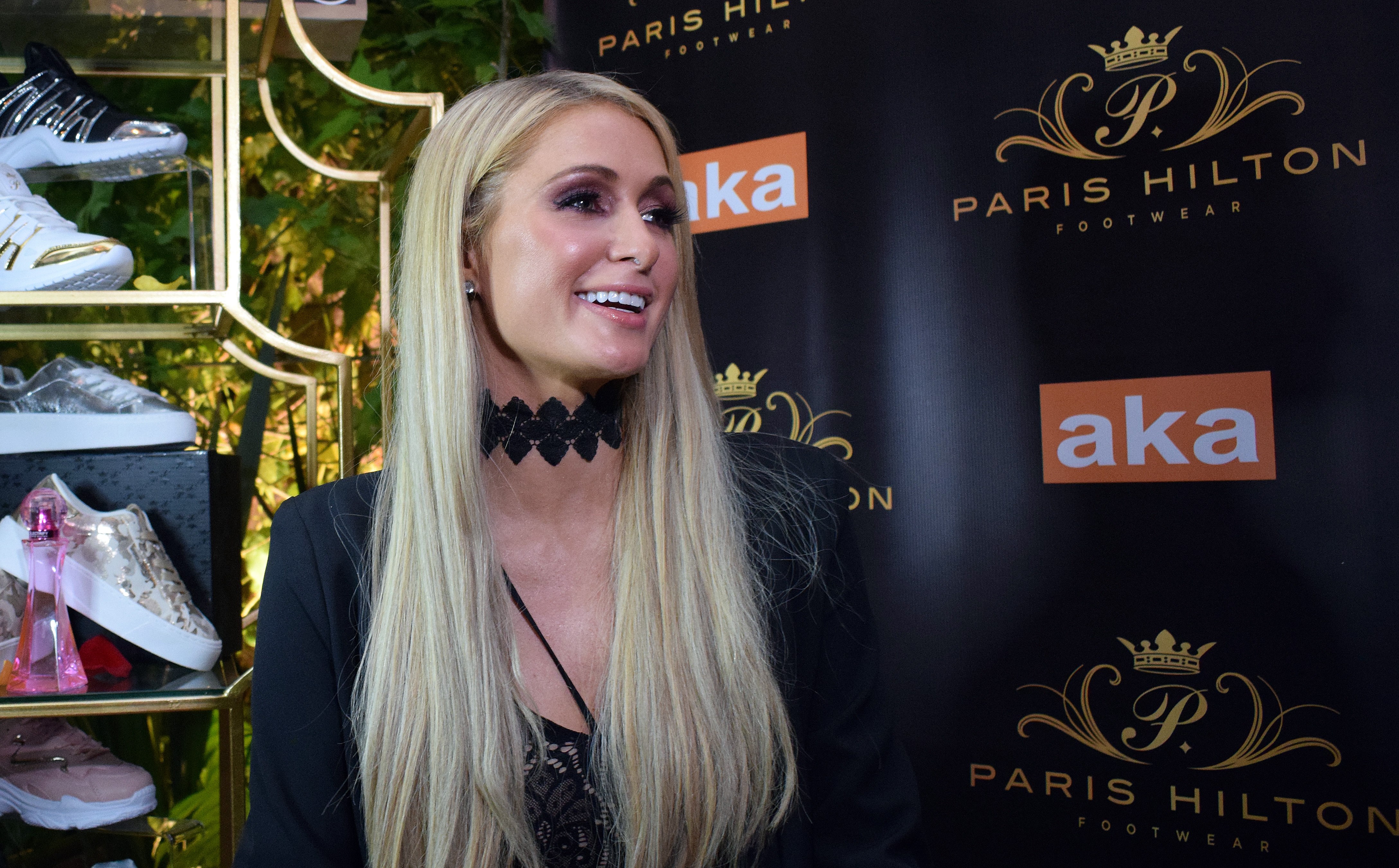 epa08010524 US media personality Paris Hilton speaks to the media during the an event for her shoe collection, in Bogota, Colombia, 19 November 2019.  EPA-EFE/DANIELA CONDOR