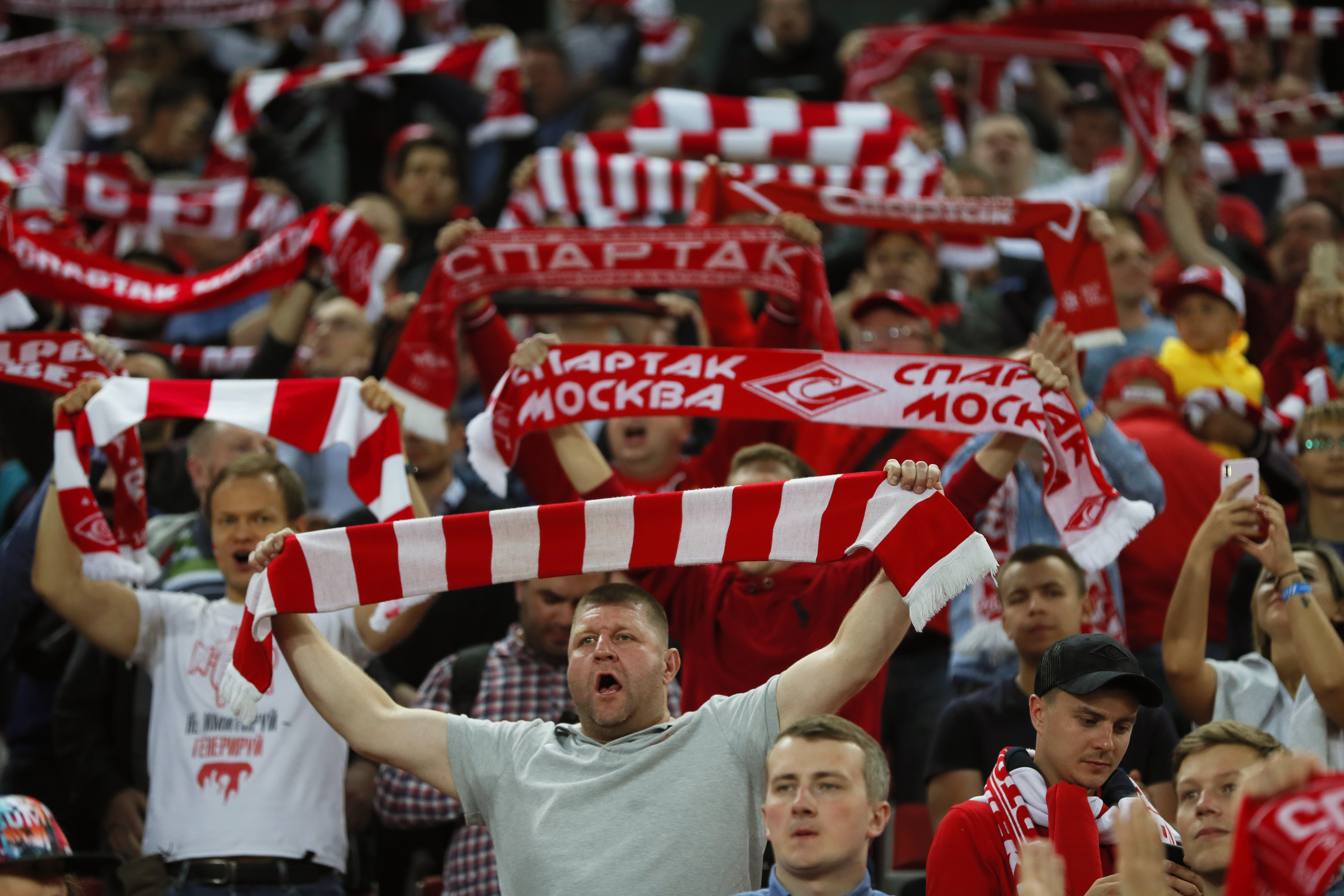 epa07802277 Supporters of Spartak cheer during the UEFA Europa League playoff, second leg soccer match between Spartak Moscow and Sporting Braga in Moscow, Russia, 29 August 2019.